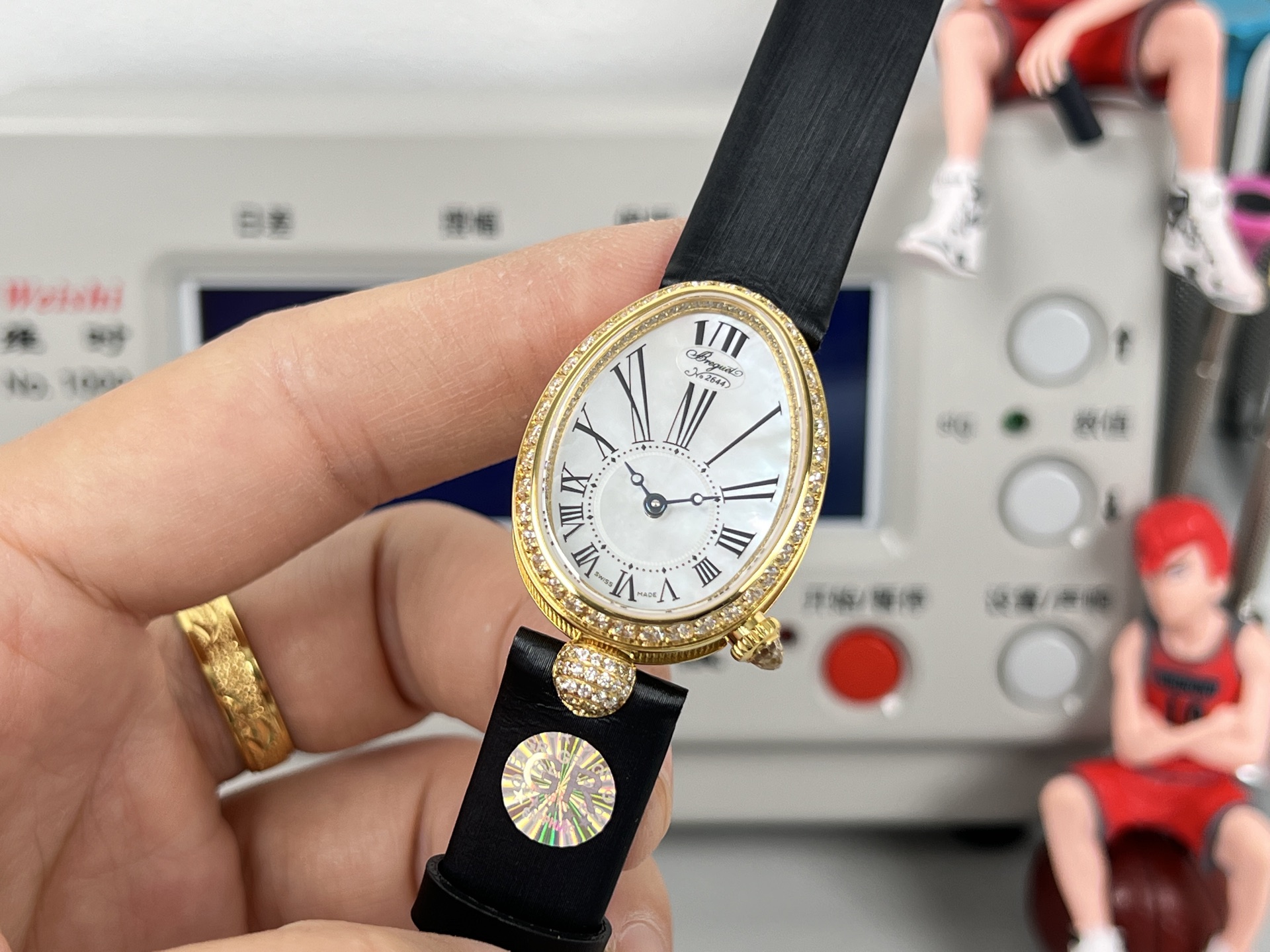 Breguet Reine de Naples 8928BA / 51 / 944 / DD0D3L yellow gold diamond-set bezel / case, white mother-of-pearl dial, black leather strap 33.5mm Women's Automatic