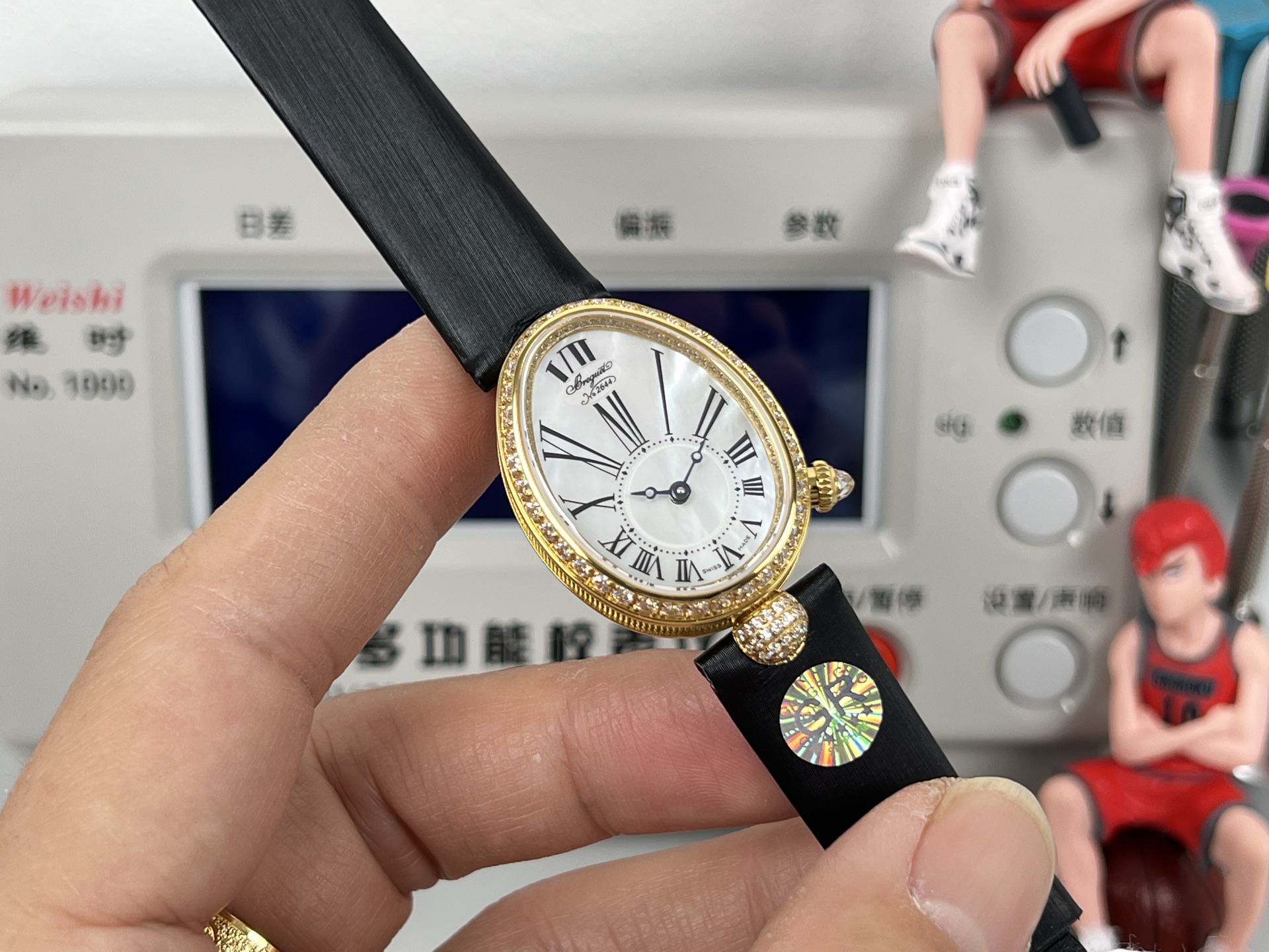 Breguet Reine de Naples 8928BA / 51 / 944 / DD0D3L yellow gold diamond-set bezel / case, white mother-of-pearl dial, black leather strap 33.5mm Women's Automatic