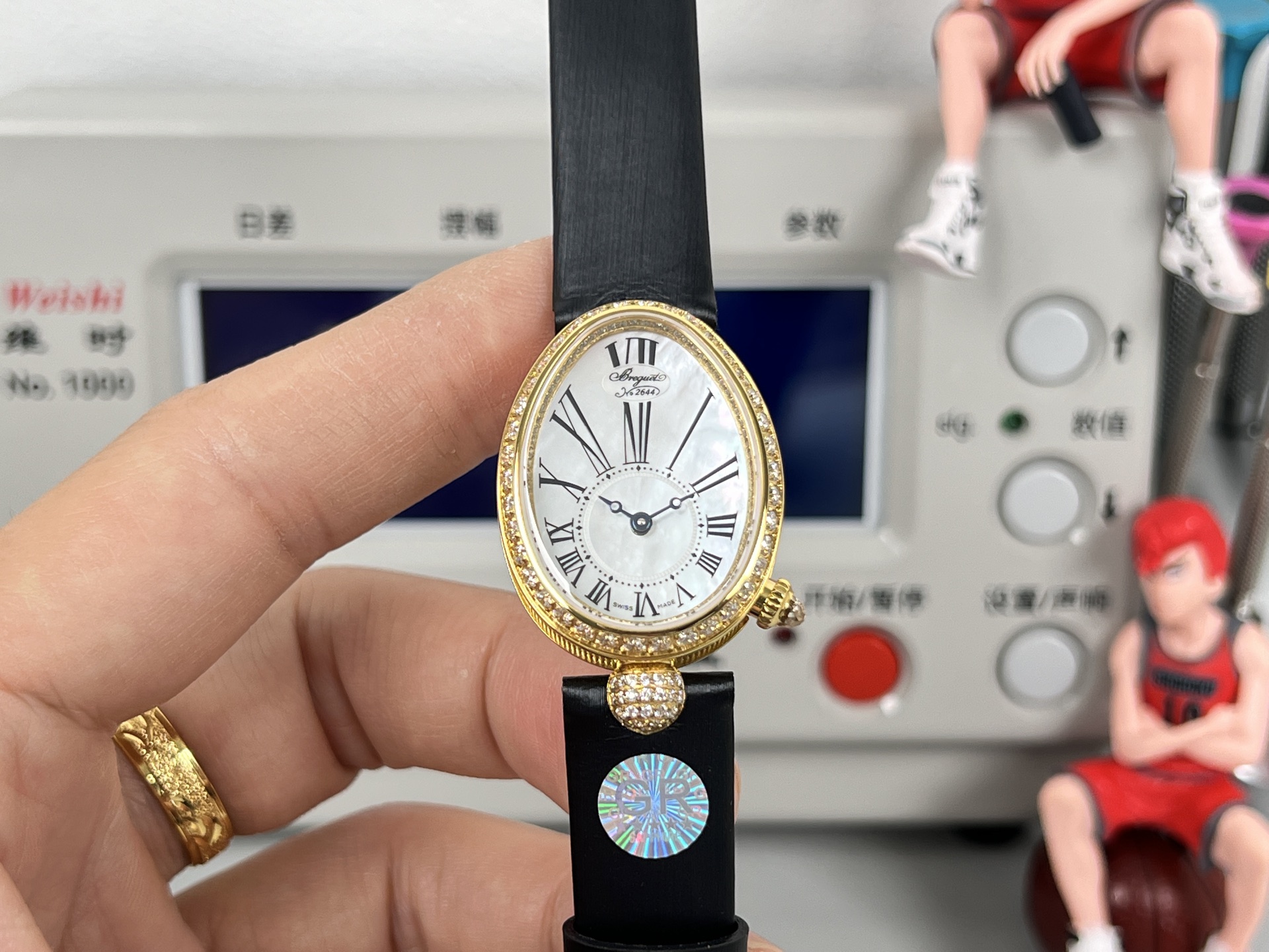 Breguet Reine de Naples 8928BA / 51 / 944 / DD0D3L yellow gold diamond-set bezel / case, white mother-of-pearl dial, black leather strap 33.5mm Women's Automatic