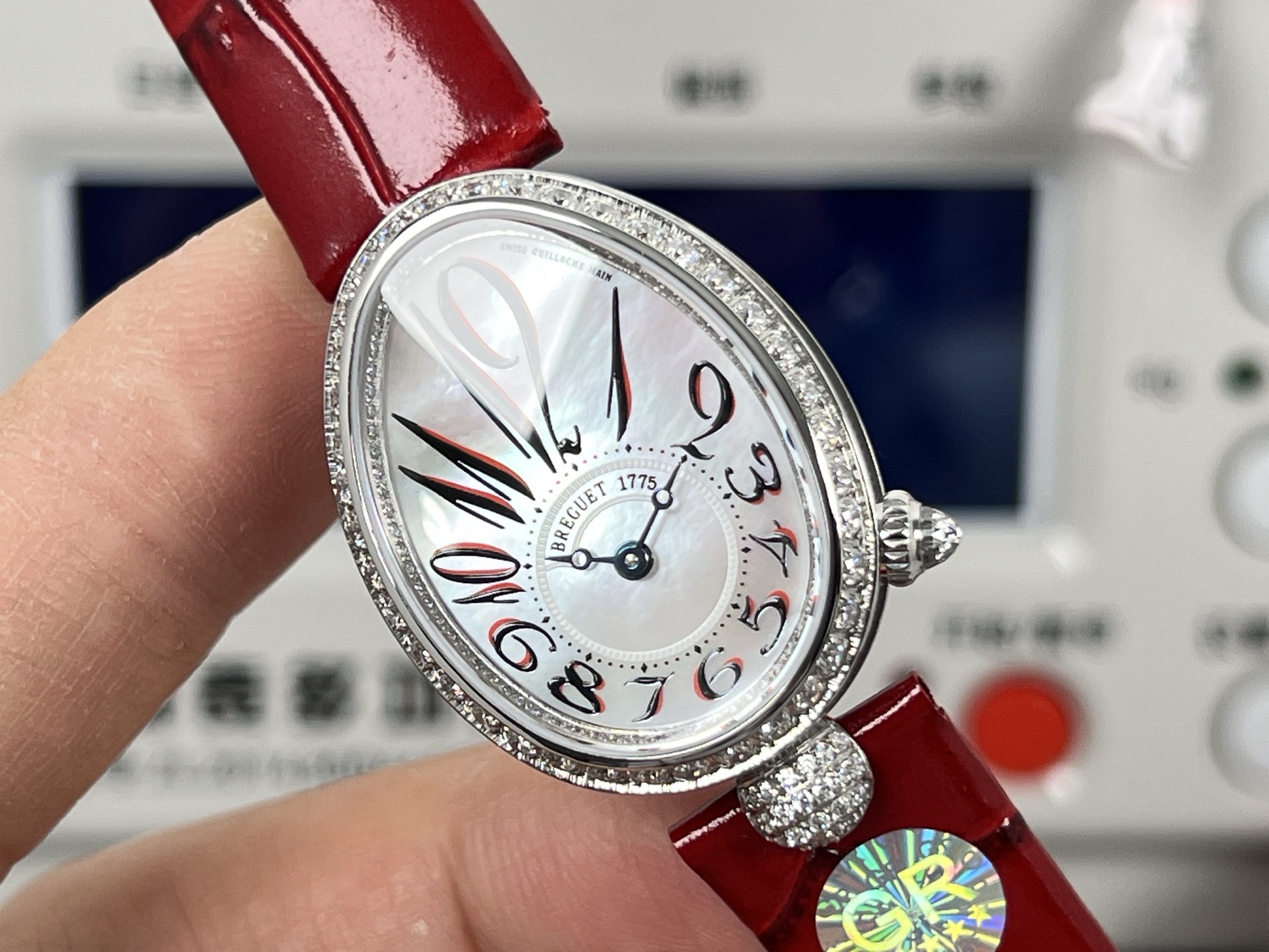 Breguet Reine de Naples 8928BB / 5P / 944 / D0OD3L pink strap, white diamond-set case / bezel, mother-of-pearl dial 33mm Women's Automatic