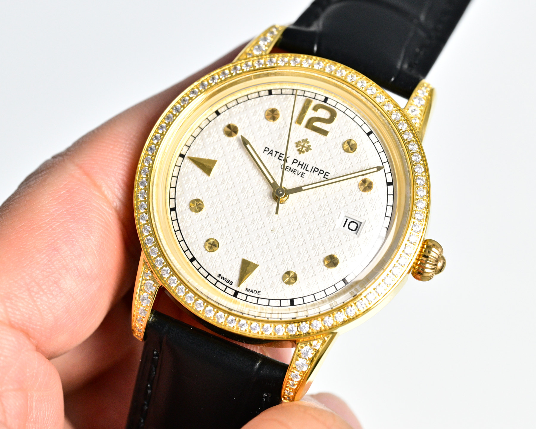 Patek Philippe Calatrava yellow gold case and diamond bezel, white dial, black leather strap 35mm Men's Automatic