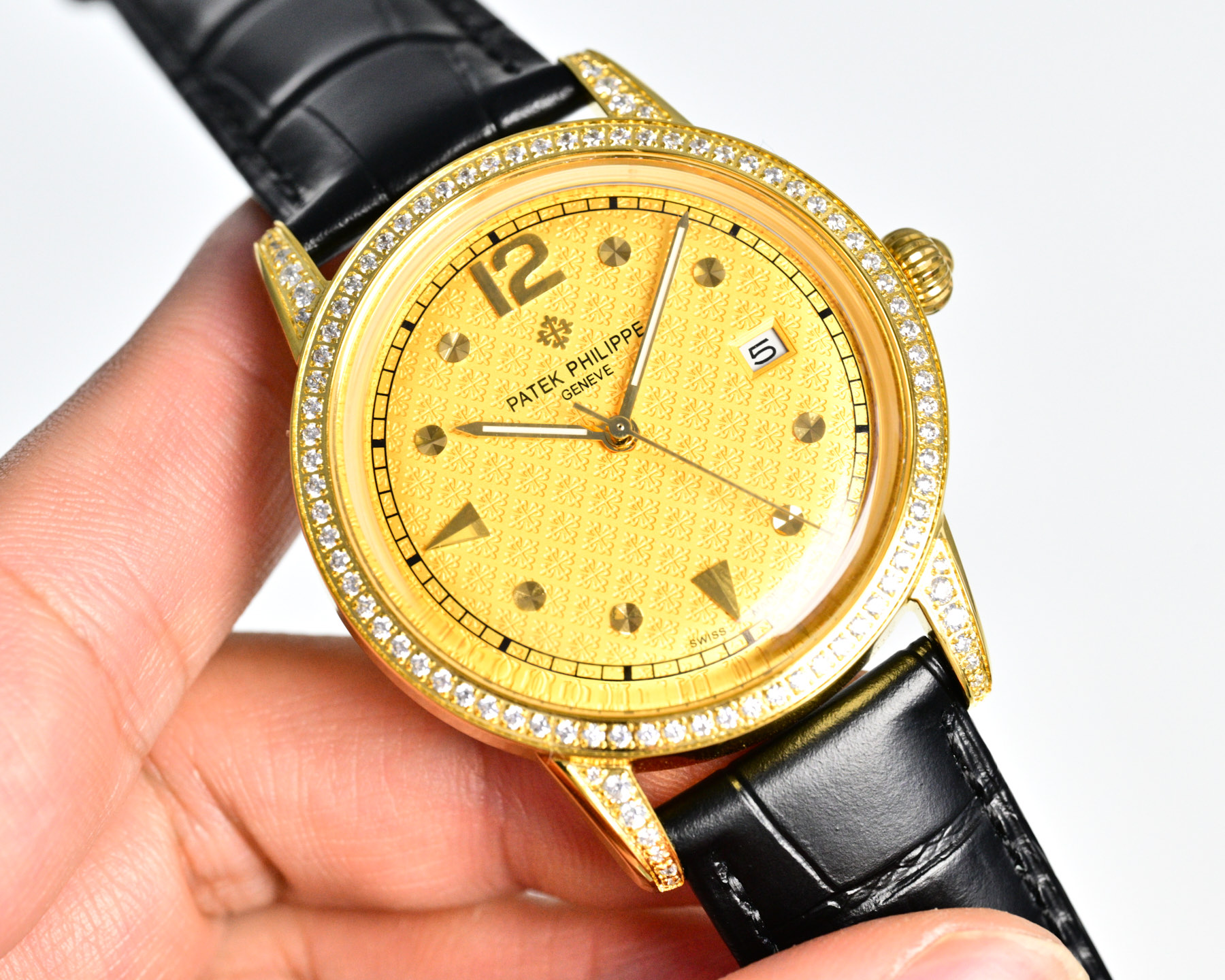 Patek Philippe Calatrava yellow gold case and diamond bezel, white dial, black leather strap 35mm Men's Automatic