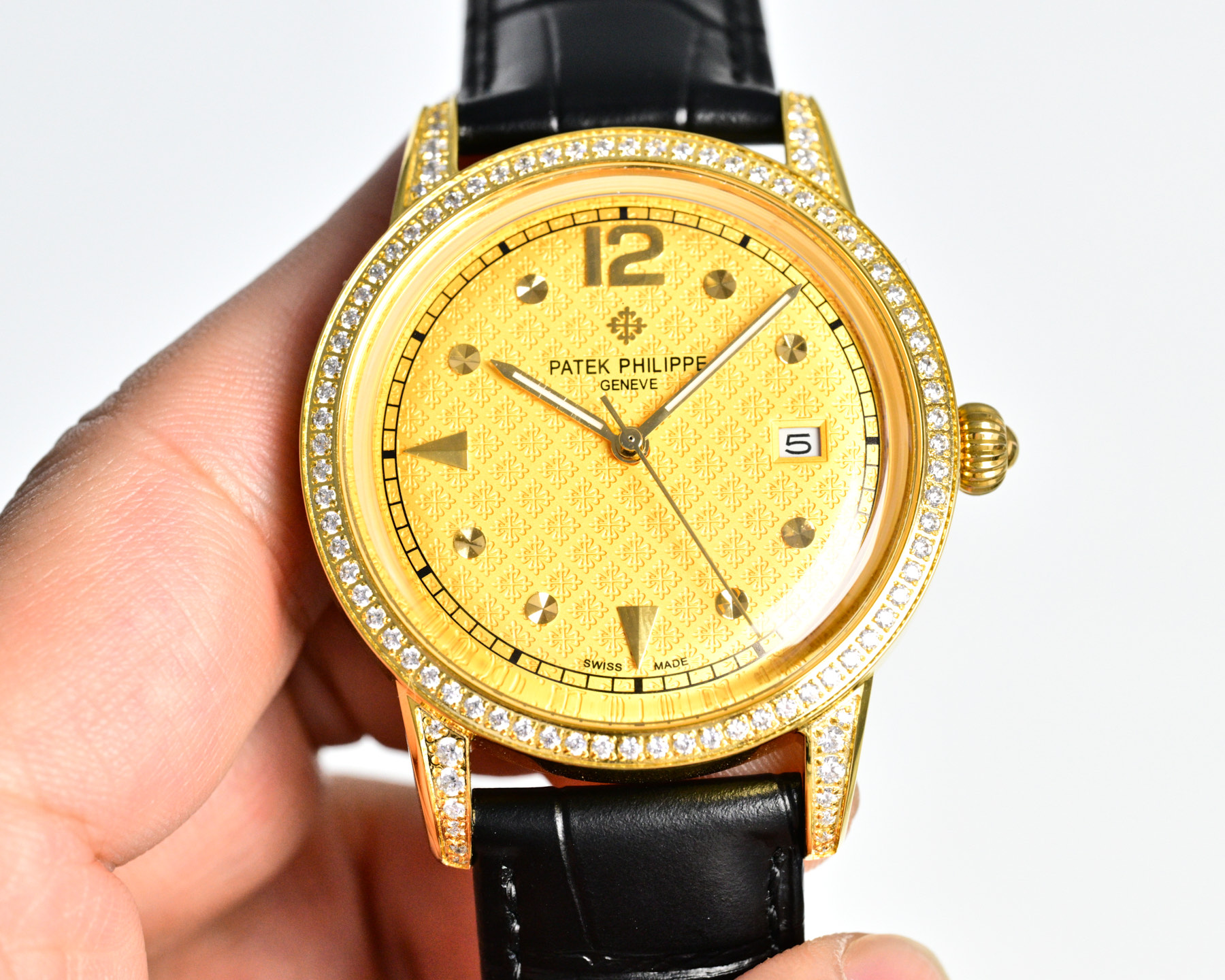Patek Philippe Calatrava yellow gold case and diamond bezel, white dial, black leather strap 35mm Men's Automatic