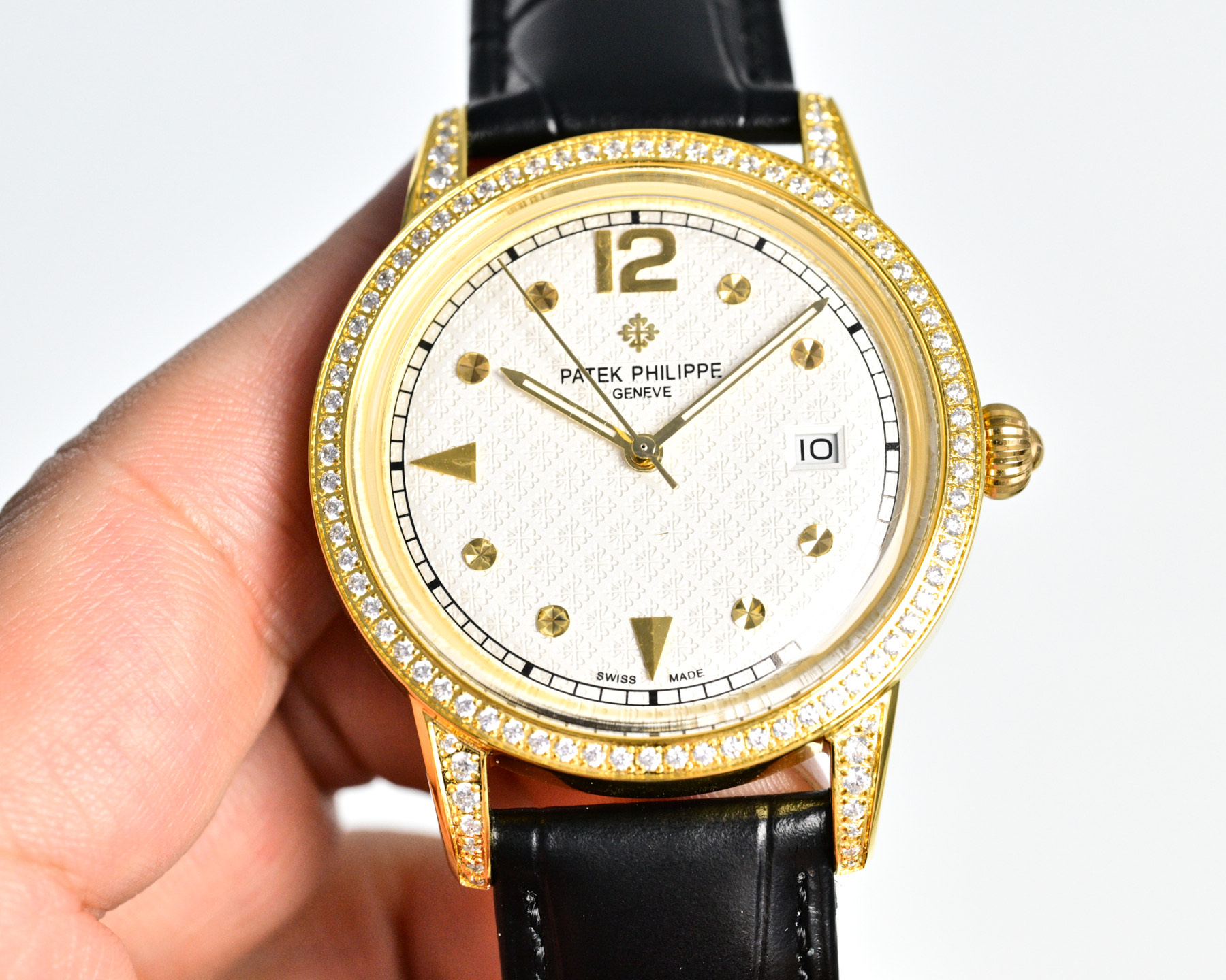 Patek Philippe Calatrava yellow gold case and diamond bezel, white dial, black leather strap 35mm Men's Automatic