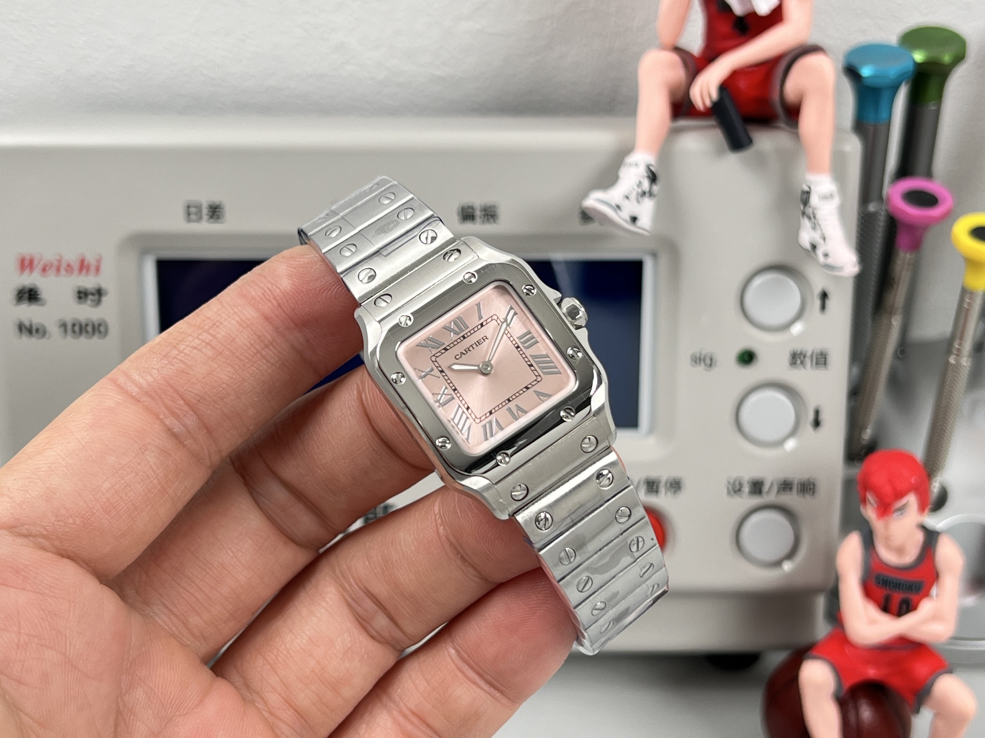 Cartier Santos de Cartier WSSA0082 stainless steel case and bezel, silver dial, stainless steel bracelet 27mm Women's Quartz