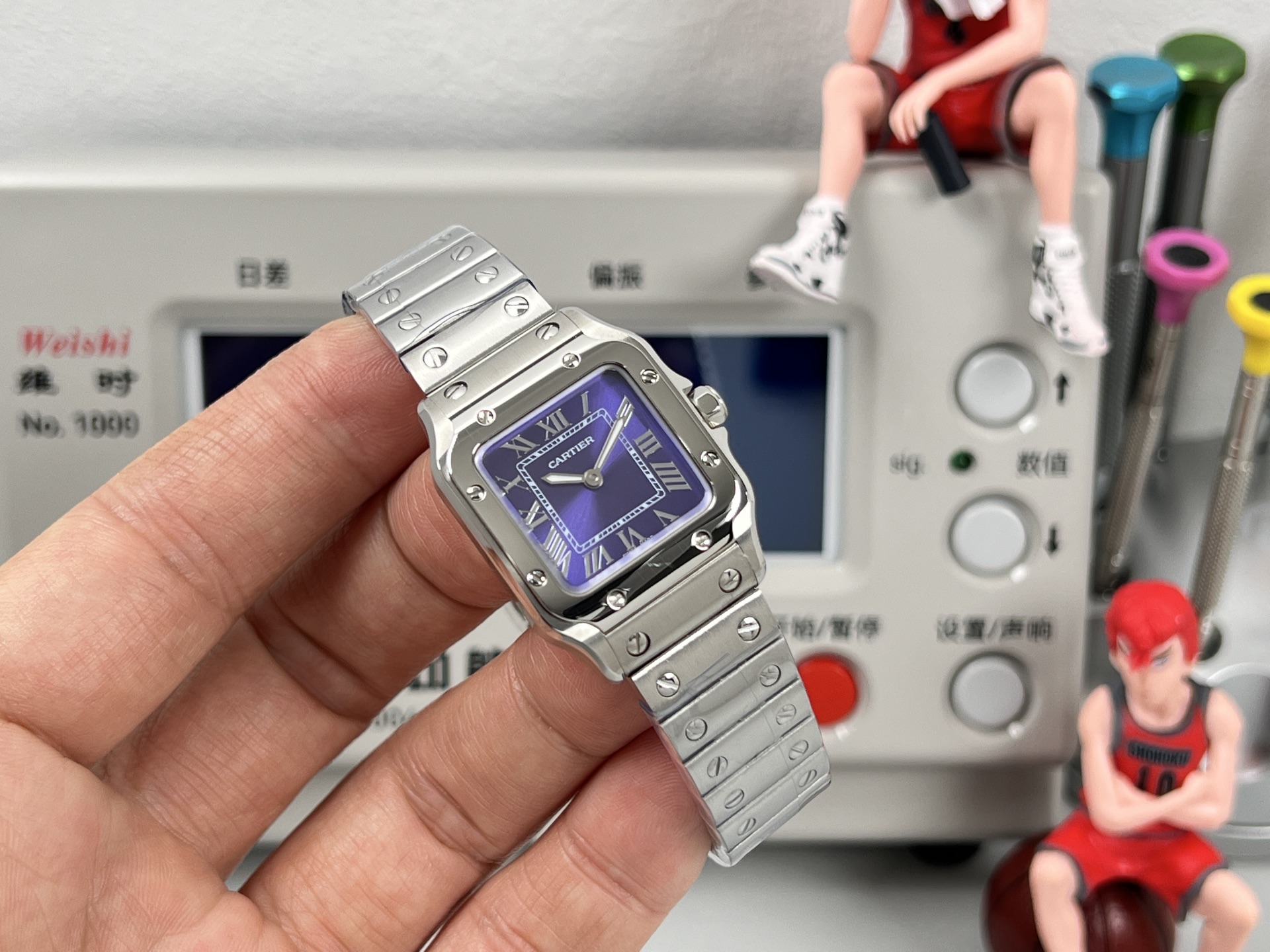 Cartier Santos de Cartier WSSA0082 stainless steel case and bezel, silver dial, stainless steel bracelet 27mm Women's Quartz