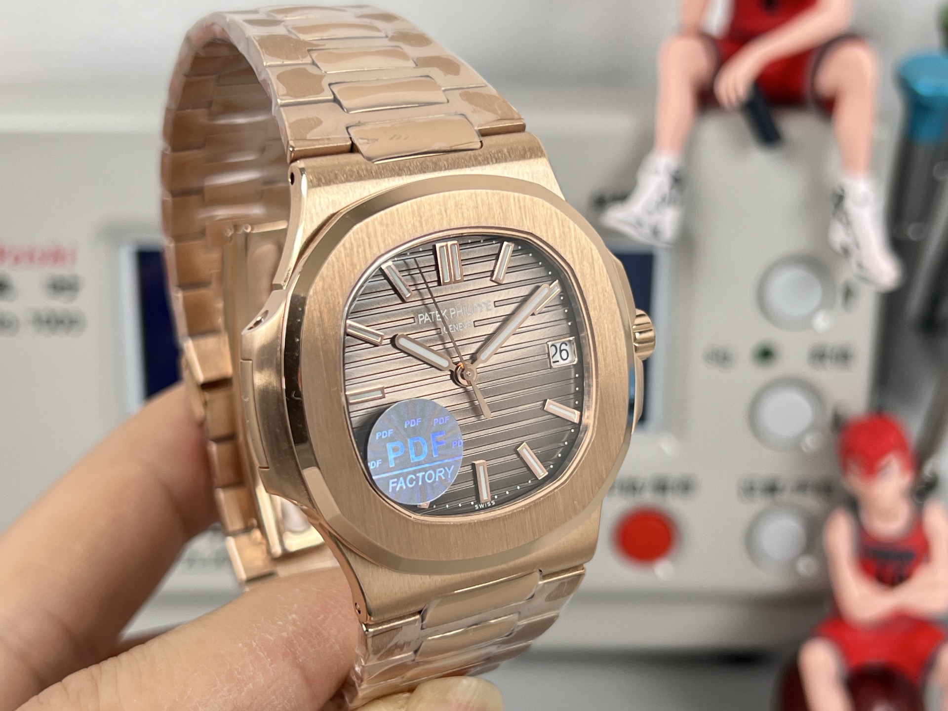 Patek Philippe Nautilus 5711 / 1A rose gold case, bezel and bracelet; brown dial 40mm Men's Automatic