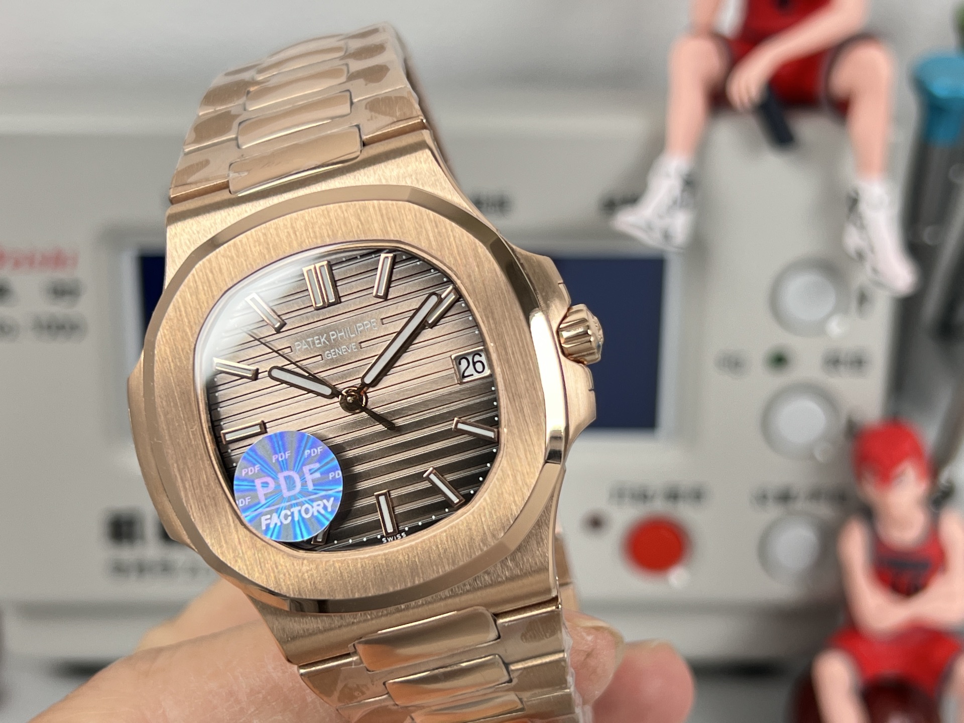 Patek Philippe Nautilus 5711 / 1A rose gold case, bezel and bracelet; brown dial 40mm Men's Automatic