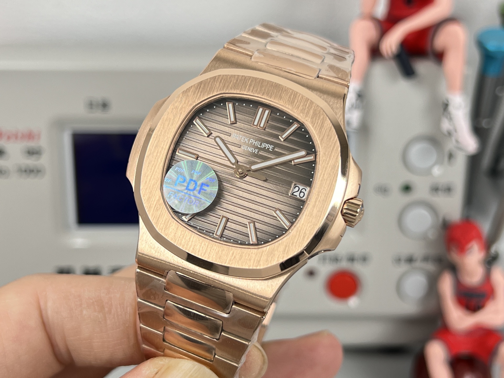 Patek Philippe Nautilus 5711 / 1A rose gold case, bezel and bracelet; brown dial 40mm Men's Automatic