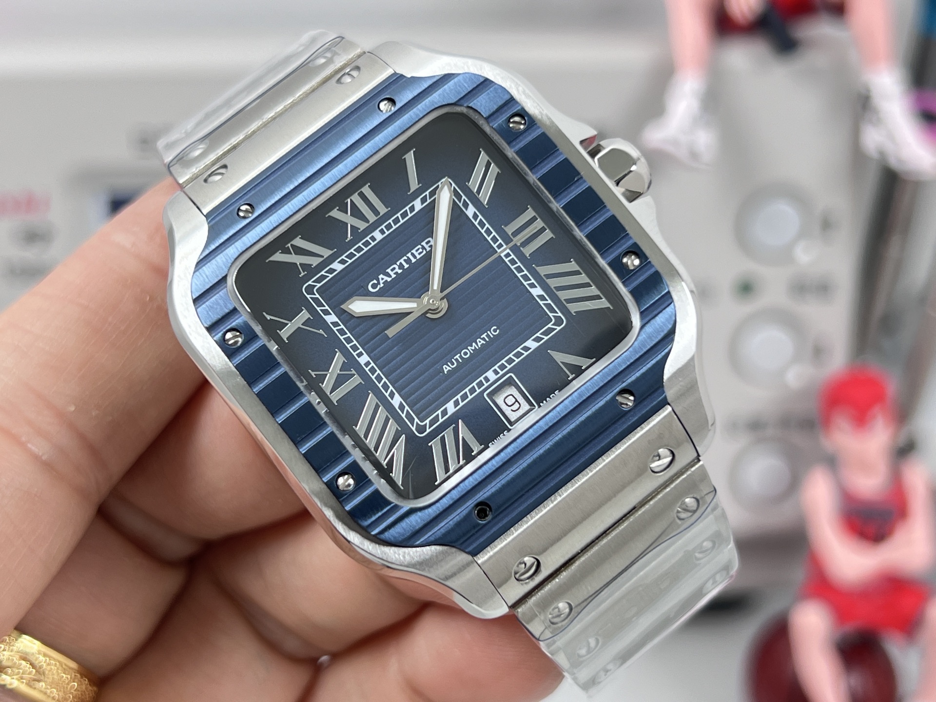 Cartier Santos de Cartier stainless steel case, blue bezel, white dial, steel bracelet 39.8mm Men's Automatic