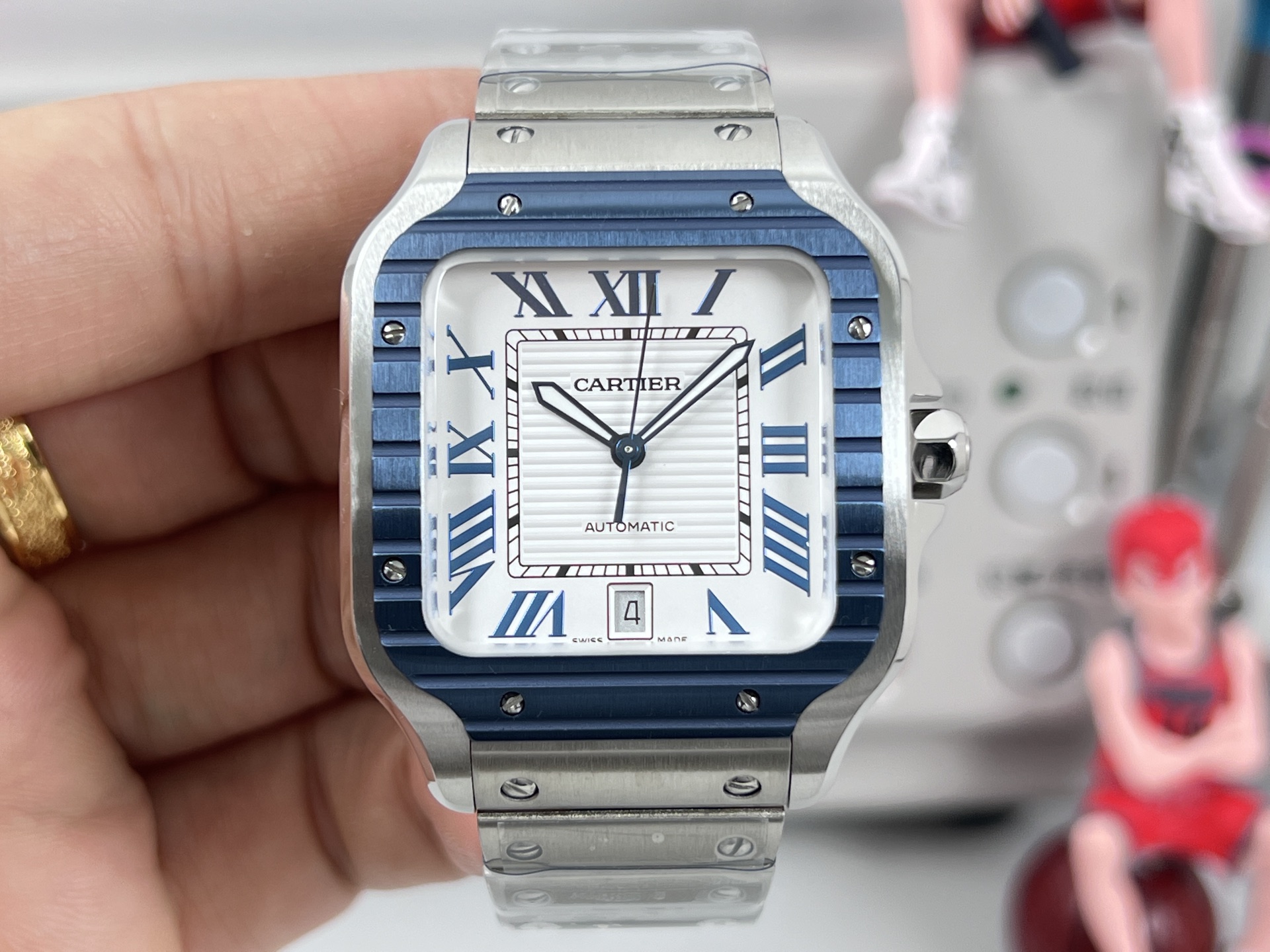 Cartier Santos de Cartier stainless steel case, blue bezel, white dial, steel bracelet 39.8mm Men's Automatic