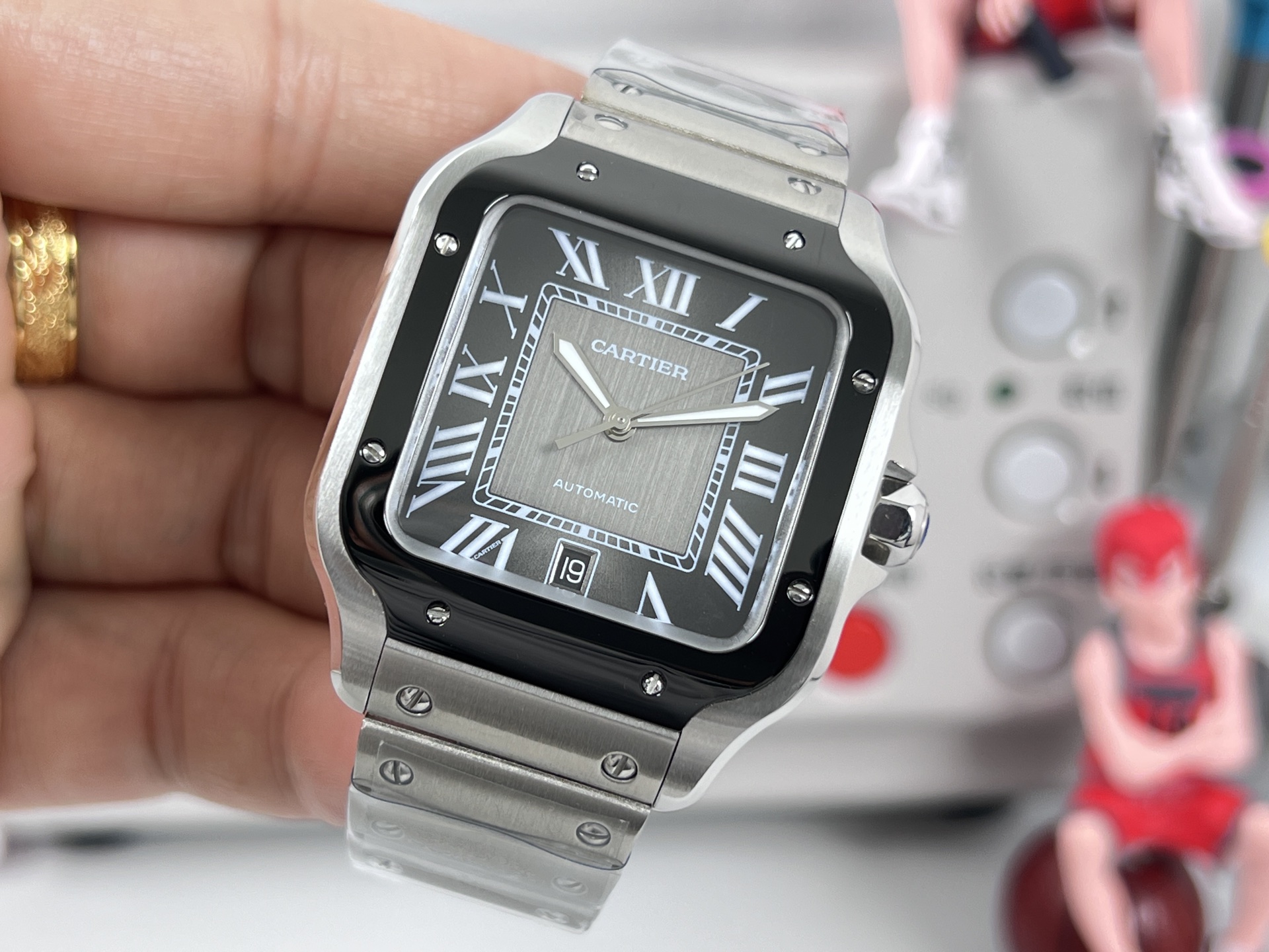 Cartier Santos de Cartier Silver case and bracelet, black bezel, black dial, white markers 39mm Men's Automatic