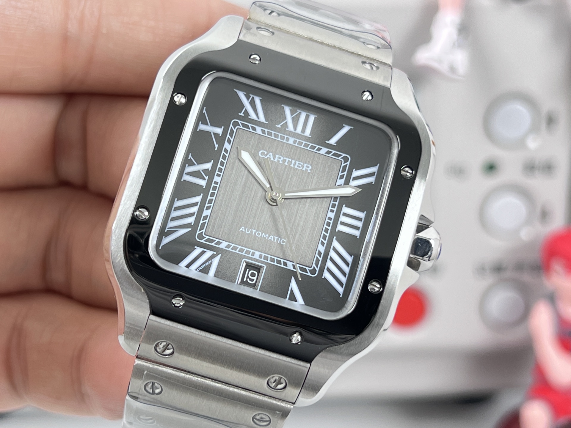 Cartier Santos de Cartier Silver case and bracelet, black bezel, black dial, white markers 39mm Men's Automatic