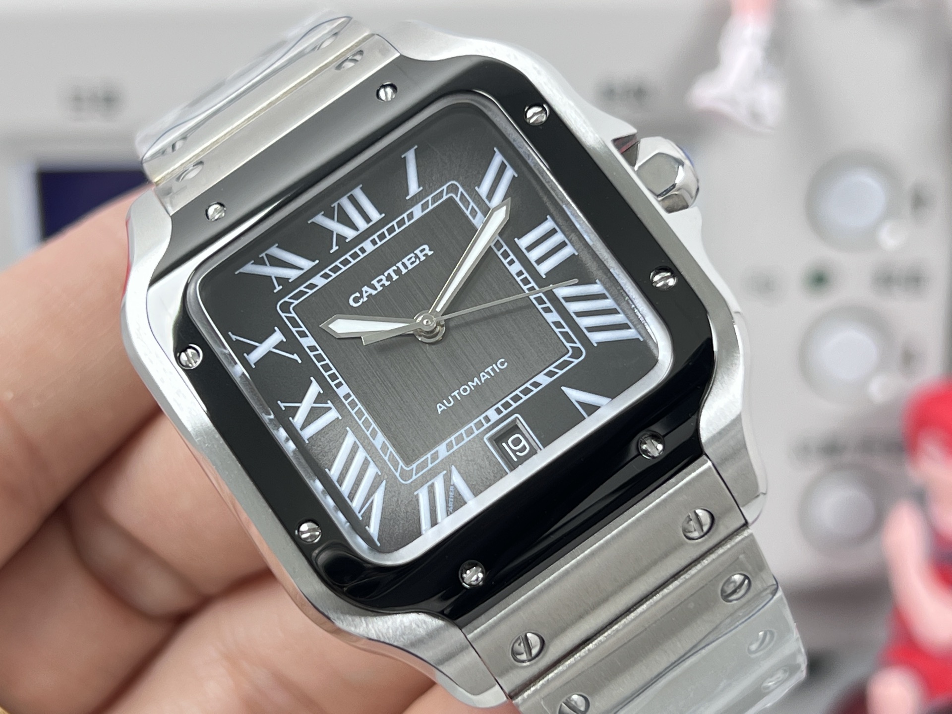 Cartier Santos de Cartier Silver case and bracelet, black bezel, black dial, white markers 39mm Men's Automatic