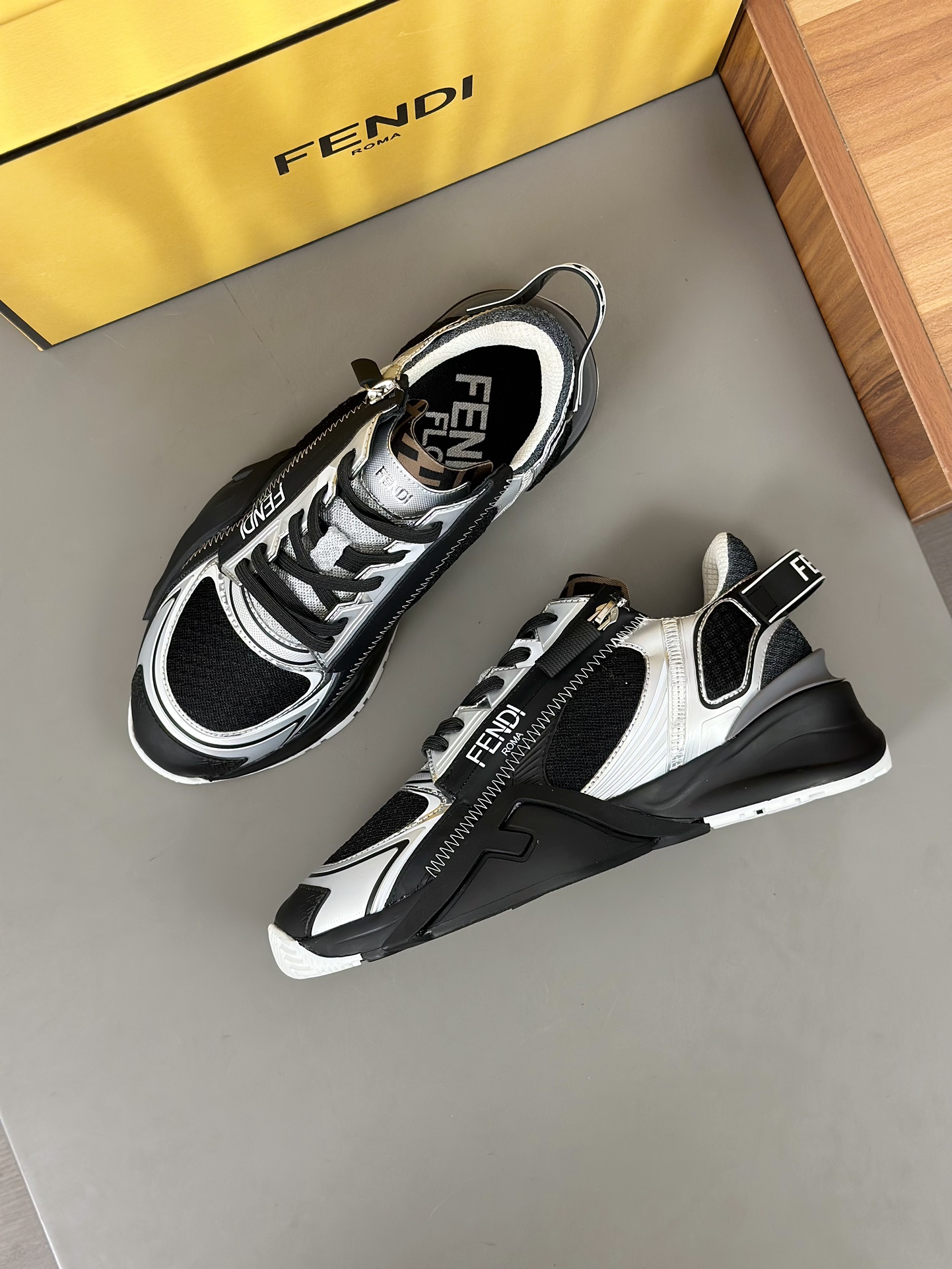 FEND* - Fendi. Zapatillas deportivas casuales Fendi Flow de hombre con tiras elásticas, cremallera l