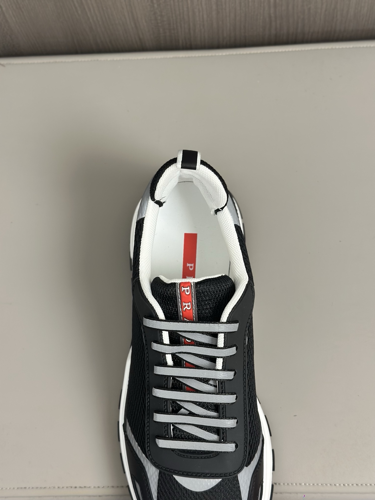 Prada Men's Leather Casual Sneakers with Breathable Mesh and Embossed Logo 9 i1743405781799 7420 0 6
