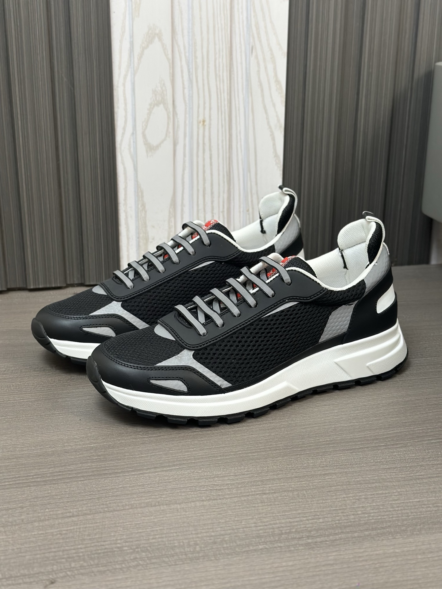 Prada Men's Leather Casual Sneakers with Breathable Mesh and Embossed Logo 7 i1743405781800 2857 0 4