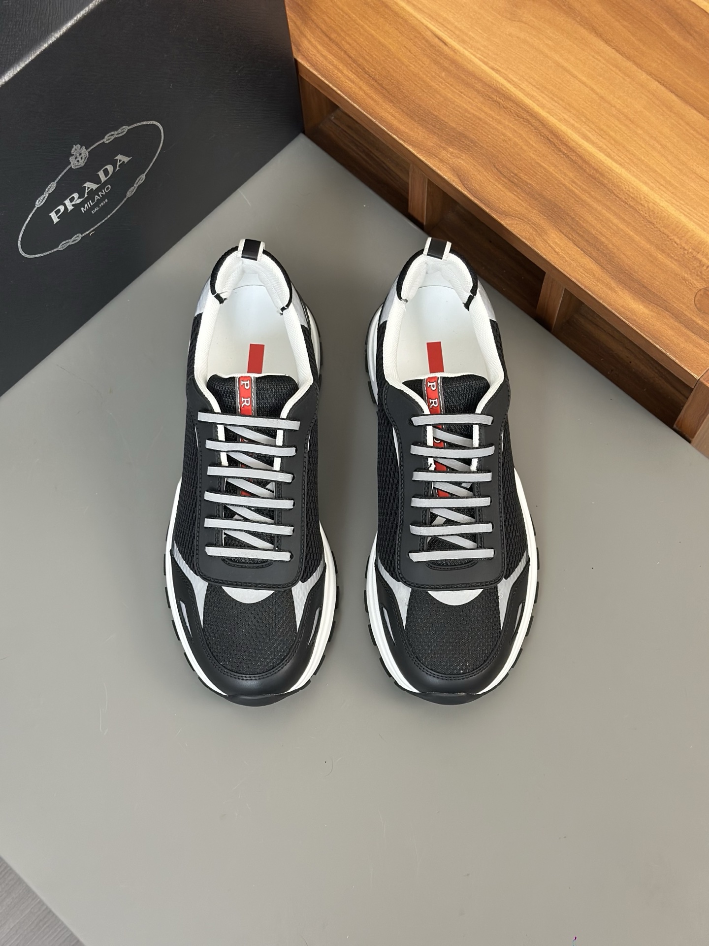 Prada Men's Leather Casual Sneakers with Breathable Mesh and Embossed Logo 1 Prada Men's Leather Casual Sneakers with Breathable Mesh and Embossed Logo