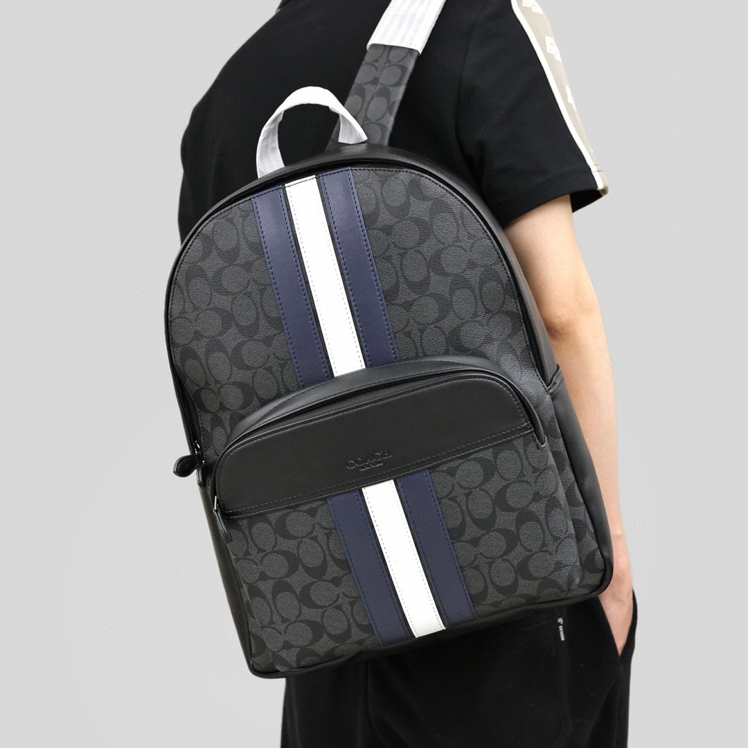 蔻驰男士双肩包
尺寸：41×30×15cm
特点：多功能设计，旅行通勤。
方式：双向拉链式开合，内置及外