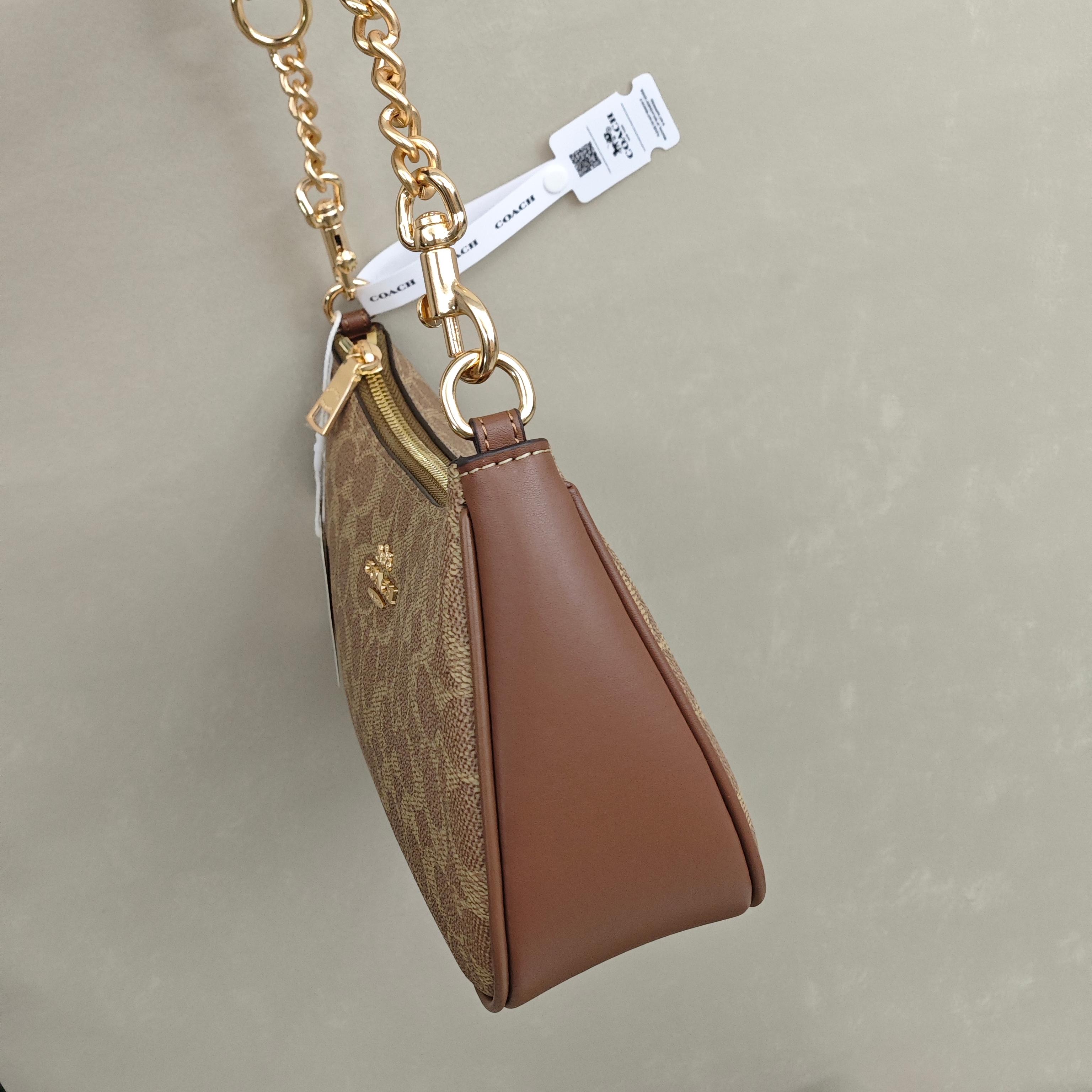 蔻驰Tire腋下包 尺寸：25×16×7.5cm简介：经典月牙包型，链条拼接皮肩带，可腋下/斜挎多背法，