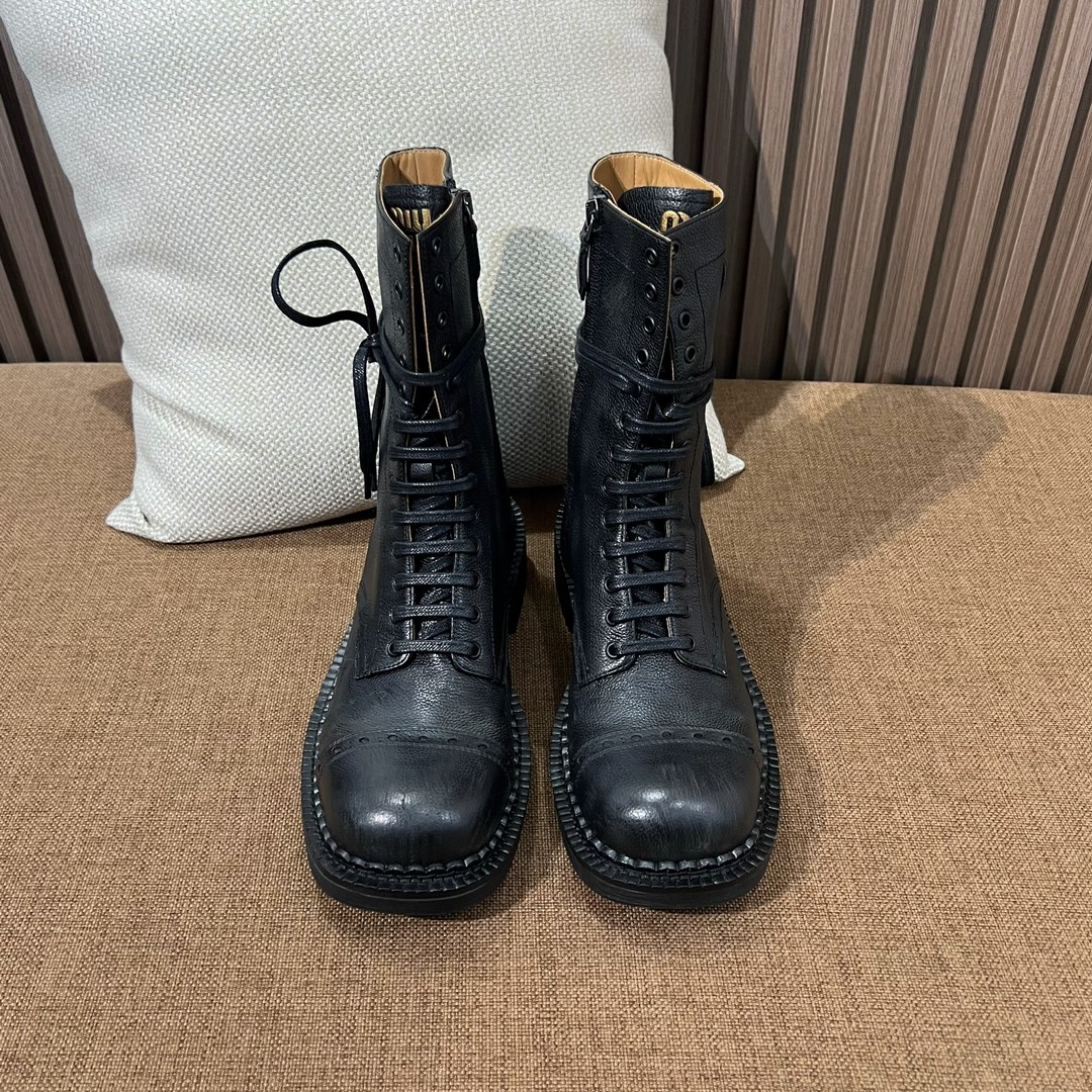 MiuMiu Botas Martin Piel de vaca Cuero Tpu Colección otoño – invierno Vintage