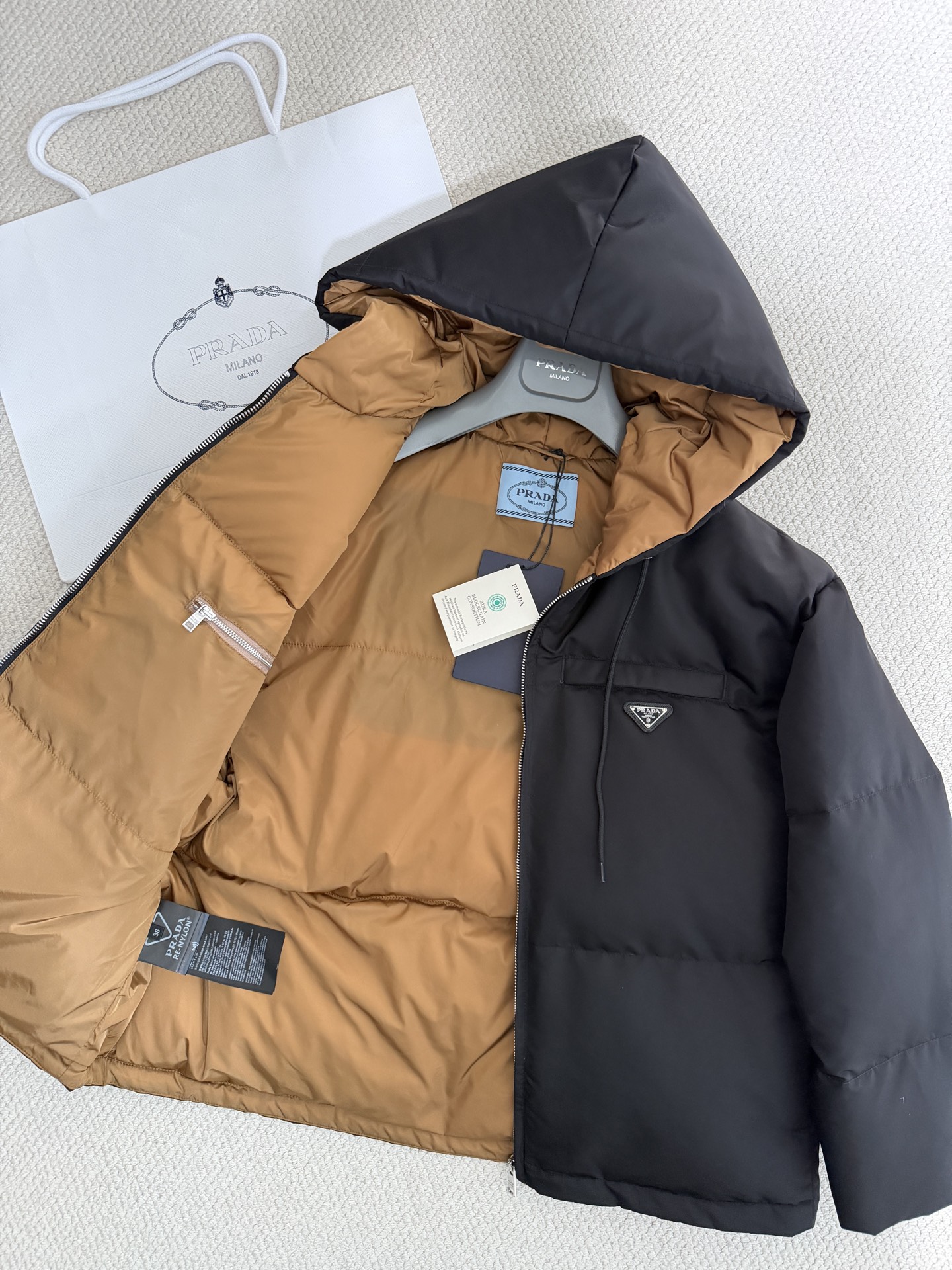 Prada Re-Nylon Padded Hooded Jacket: Lightweight, Waterproof, and Windproof 8 i1765154874176 878 0 6