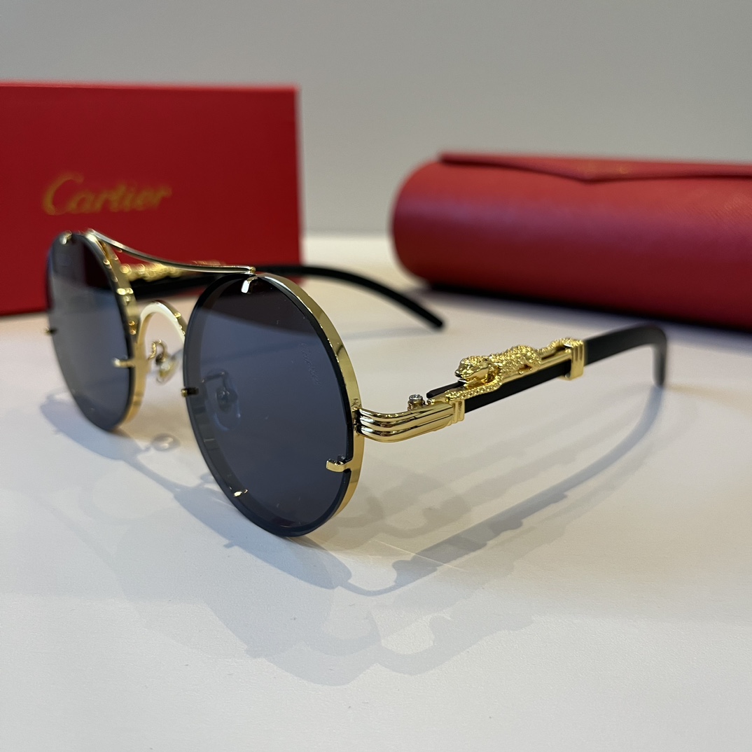 Солнцезащитные очки в металлической оправе с декором Cartier