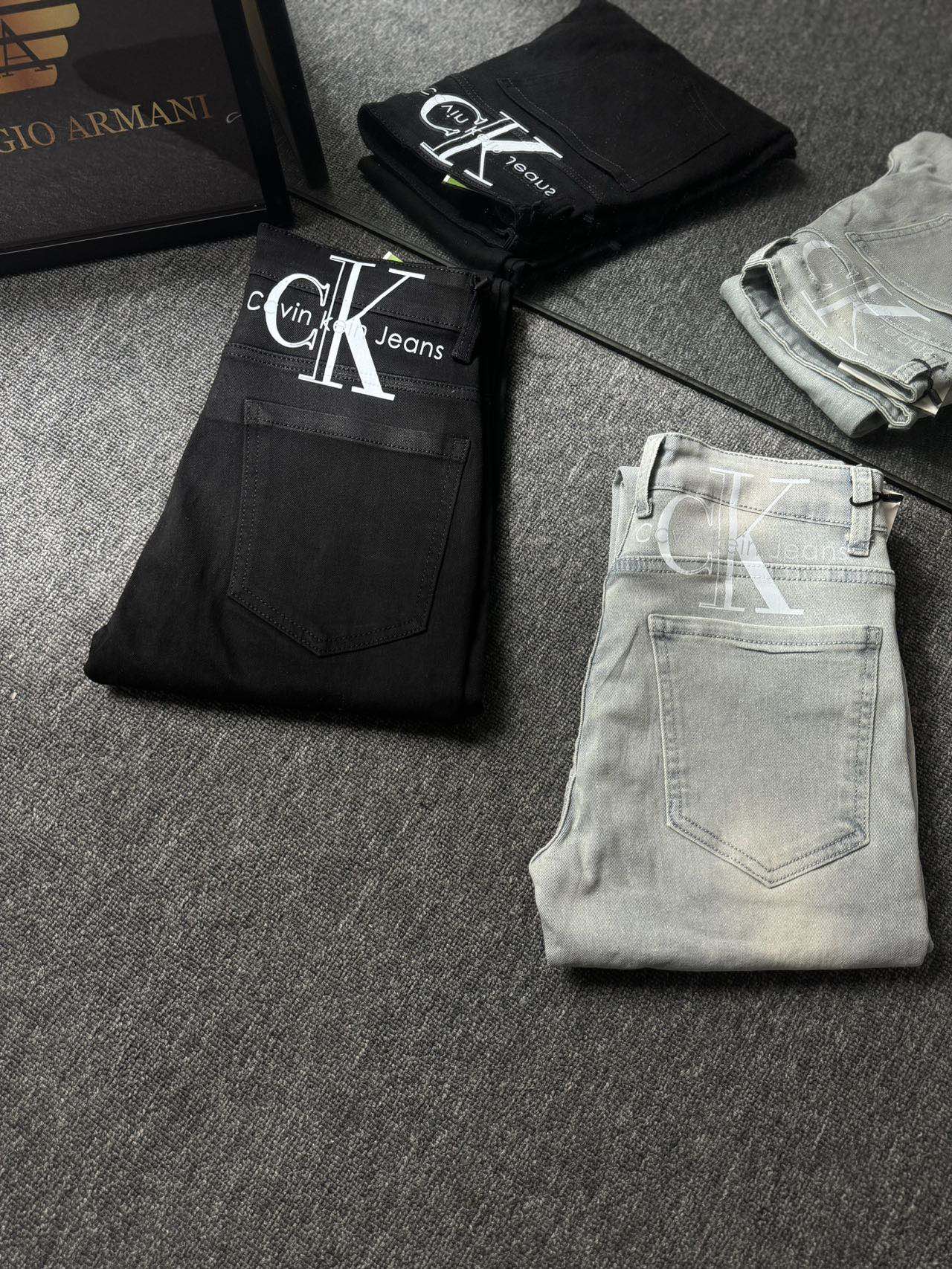 “Top-Level Khmer Water Washed CK Jeans in Black, Blue, and White, Sizes M-XXL”