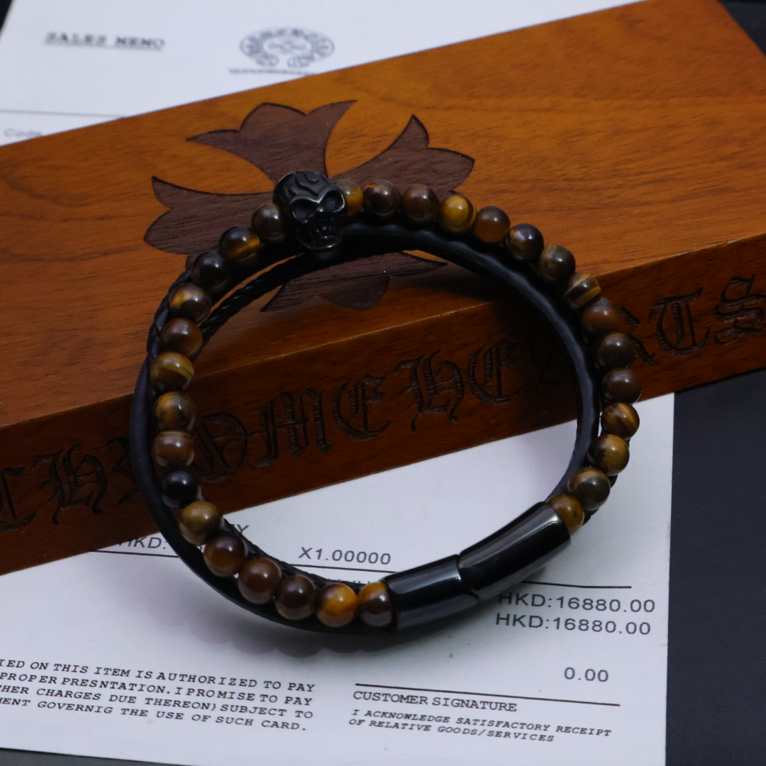 NO:114281,The Crown Bracelet, Buddhist beads and leather bracelet, the explosion of Italian luxury and street trends!  Craftsmanship replica, 1:1, surpassing the original in all directions. Top alloy material is forged with high temperature. Every time the wrist turns, it is like a beacon that ignites the street trend, releasing the fearless aura. The skull logo overlaps strongly, and the classic stripes and dark patterns are like hidden fashion passwords. The 360° three-dimensional carving process carries the brand’s background into every inch of metal. The bracelet body hides a personal mechanism, retro and old coating, and every trace of time is a brief history of the trend pioneer, engraving the rebellion and breakthroughs against the conventional. A dream choice for details control!  The carving spacing is accurate to 0.01mm, and the texture of the micron-level replica counter is replicated. When you wear it, you will instantly have the eye-catching aura of 60WOO  luxury products, becoming the focus of the street. Ergonomic design, the curve of the opening fits the wrist, the more you wear it, the more unrestrained temperament it looks. The double bracelet is stacked, completing the passionate ritual of the trendy partner, is your trendy tacit understanding. This is the ultimate killer of street trends, and the scepter of personality in your hand. Having it, injects soul into your outfits and becomes the coolest existence on the street. Confidence comes from quality!  If you can't wear it, the same cool feeling will be fully refunded   mental loss fee!  This is our commitment and absolute confidence in quality. New luxury trends # Italian aesthetic pioneer # Trend key # Wearing it will explode the streets without being wild or not wearing | No cool or not selling | Countdown to trends at the wrist | Ready, jewelry boutiques, chrome hearts, bracelet19860909批燃情登场 克罗心手镯 佛珠加皮手镯,意式奢华与街头潮流的炸裂碰撞！ 匠心复刻,1:1 全方位超越原版.顶级合金材质高温锻造,每一次手腕的转动,都似点燃街头潮流的烽火,释放无畏气场. 骷髅头标志强势交叠,经典条纹暗纹如隐匿的时尚密码,360° 立体雕花工艺,将品牌底蕴刻入每一寸金属. 镯身暗藏个性机关,复古做旧镀层,每一道岁月痕迹,都是潮流先锋的不羁简史,镌刻着对常规的叛逆与突破. 细节控的梦幻之选！雕花间距精确到0.01mm,微米级复刻专柜质感,戴上它,瞬间拥有60WOO 奢品的吸睛气场,成为街头焦点 人体工学设计,开口弧度贴合手腕,越戴越显不羁气质.  双镯叠戴间,完成潮流伙伴的热血仪式,是专属你们的潮流默契.这是街头潮流的终极杀器,是 手中的个性权杖.拥有它,为你的穿搭注入灵魂,成为街头最酷的存在 自信源于品质！若戴不出 同款酷感,全额退款 精神损失费！这是我们的承诺,也是对品质的绝对自信. 奢品新潮流 # 意式美学先锋 # 潮流密钥 # 佩戴即炸街 不野不戴｜不酷不卖｜腕间潮流倒计时｜  已就绪,饰品精品,chrome hearts,bracelet,Jewelry