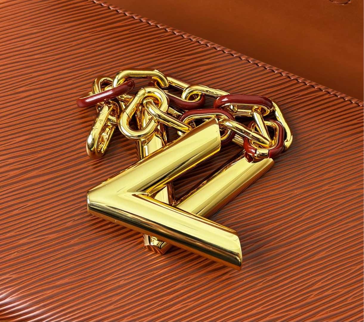 M12736棕色(动态码)【顶级原单】专柜同步电子芯片内码出货🔥這款Slim版本的經典Twist MM手