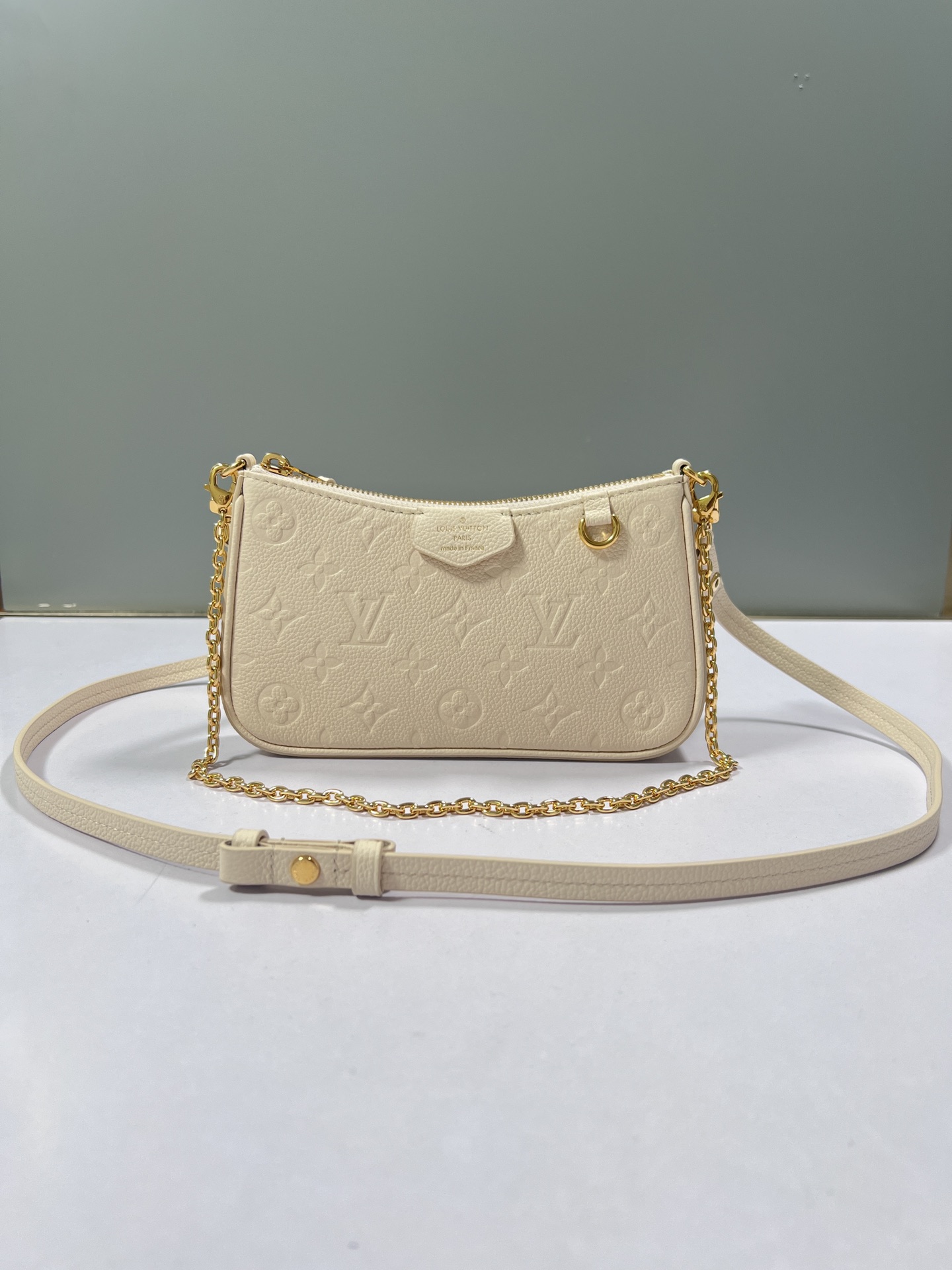Louis Vuitton LV Easy Pouch On Strap Handbags Clutches & Pouch Bags White Empreinte​ Spring Collection Chains M81066