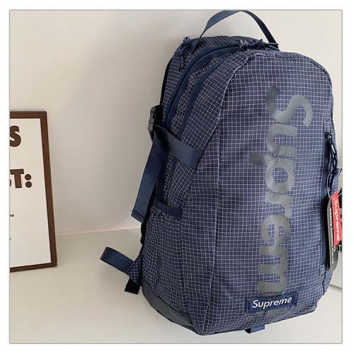 Supreme Grid Pattern Backpack - Versatile Sports & Travel Bag for All 1 Supreme Grid Pattern Backpack - Versatile Sports & Travel Bag for All