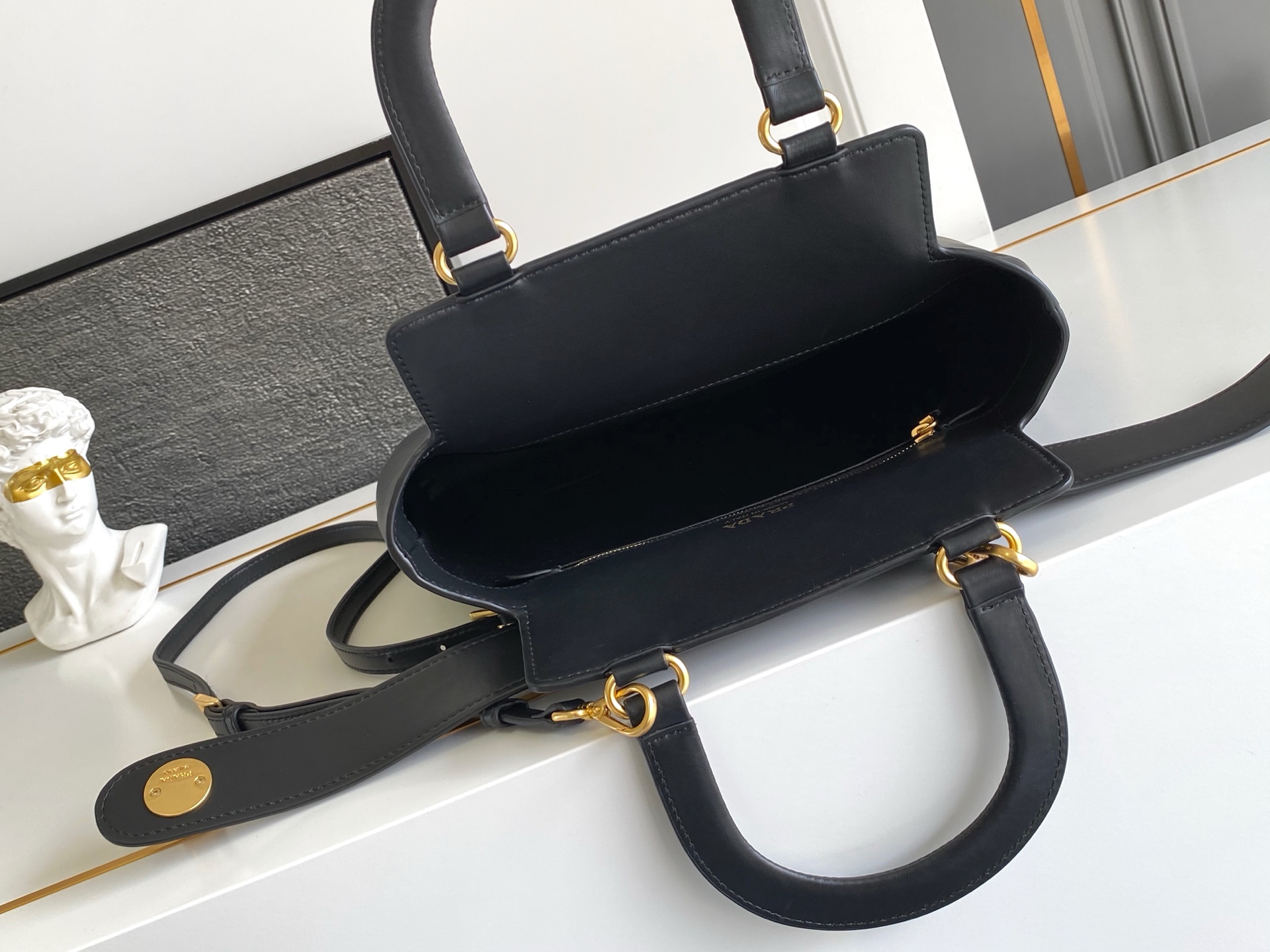 Prada Carey Medium Leather Handbag: A Fusion of Future and Retro Style 9 i1746165654316 3046 0 7