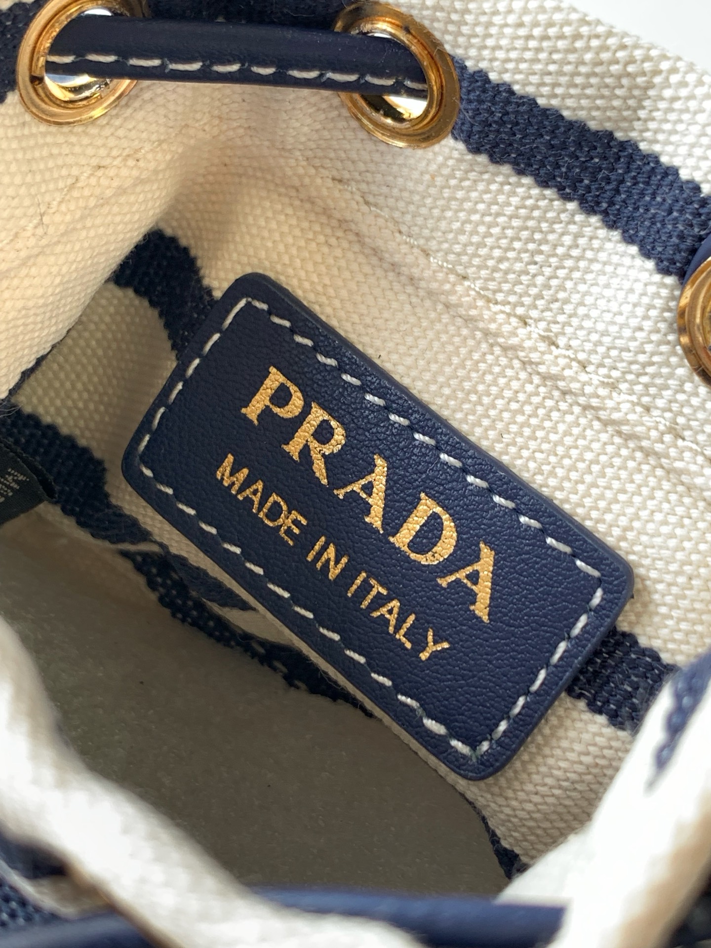 Prada Striped Fabric Mini Bucket Bag with Leather Drawstring and Shoulder Strap 10 i1750608409770 2511 0 8