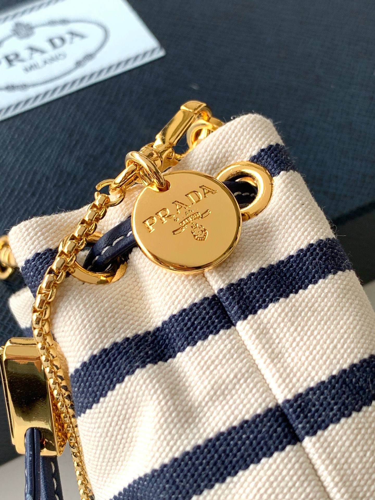 Prada Striped Fabric Mini Bucket Bag with Leather Drawstring and Shoulder Strap 7 i1750608409787 5067 0 5