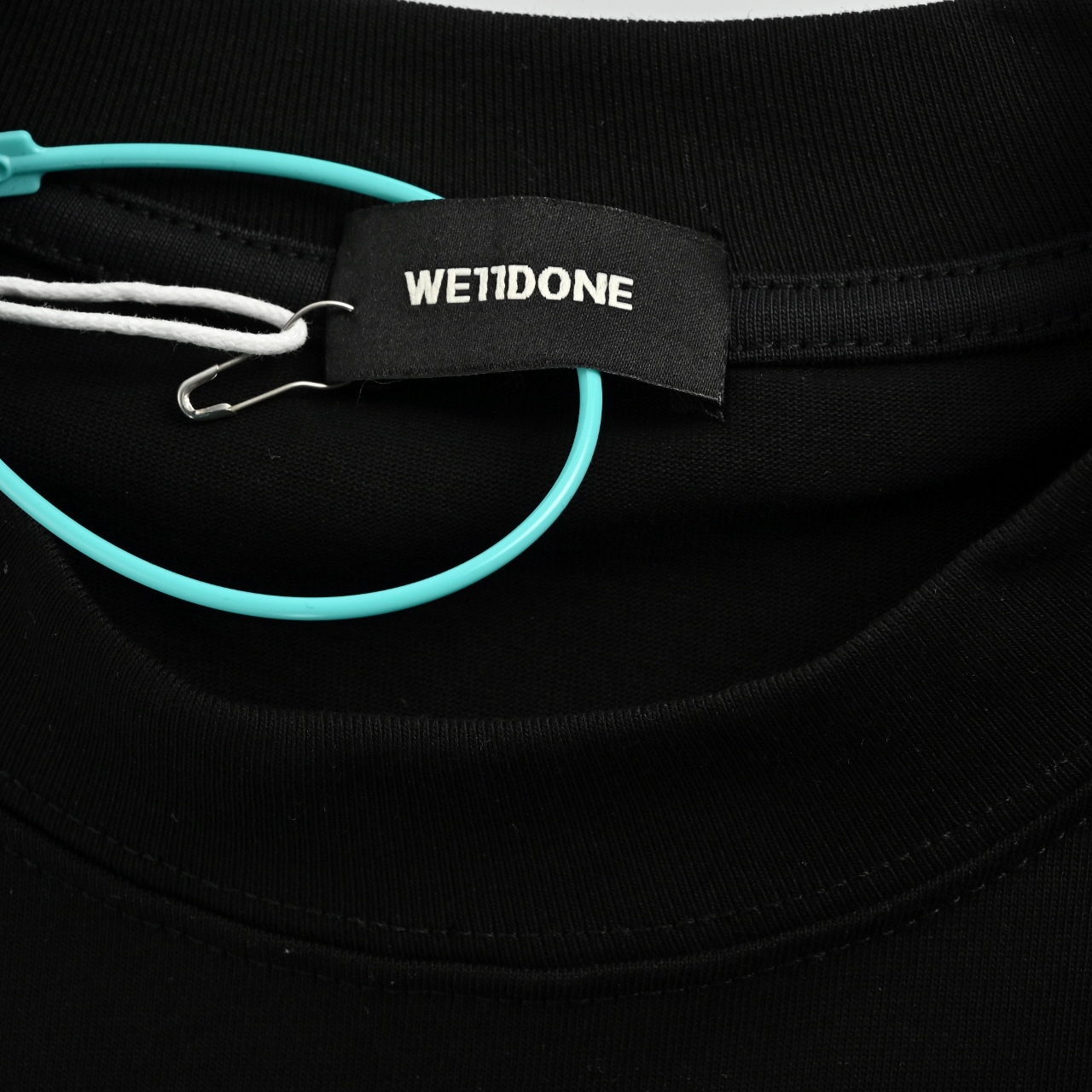WE11DONE 25SS新款字母LOGO破损龟裂印花短袖T-High Quatity Cheap Brand wholesale wholesaler seller Clothes Bags handbags Sneakers Top Fashion Clothing Shoes from China Factory Chinese suppliers best Quality Beautiful Price WE11DONE 25SS新款字母LOGO破损龟裂印花短袖T