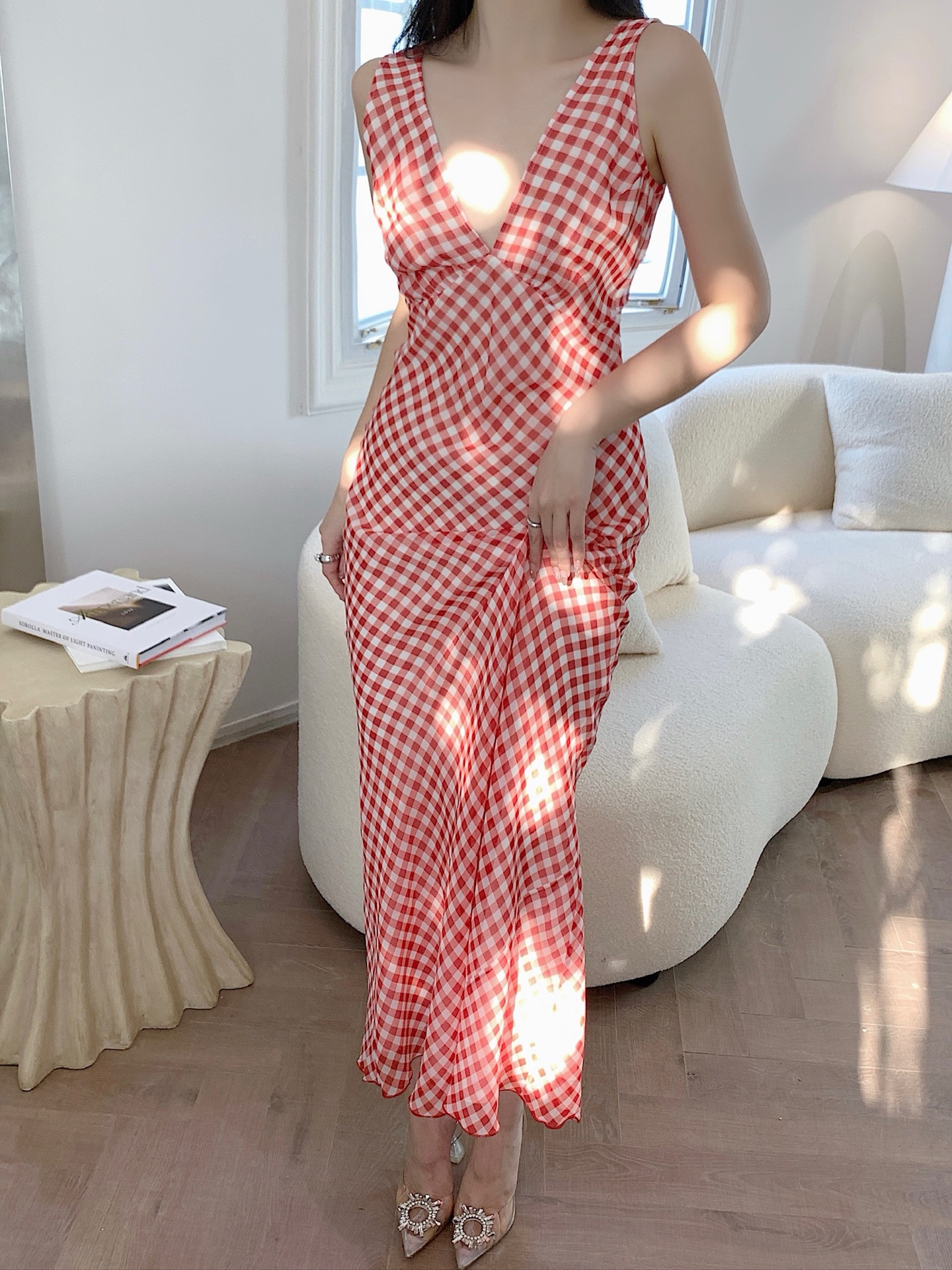 Zimmerman Red and white gingham echoes the lingering charm of a South French...