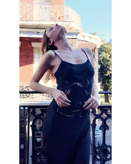 Zimmerman The black dress collides with the retro architecture