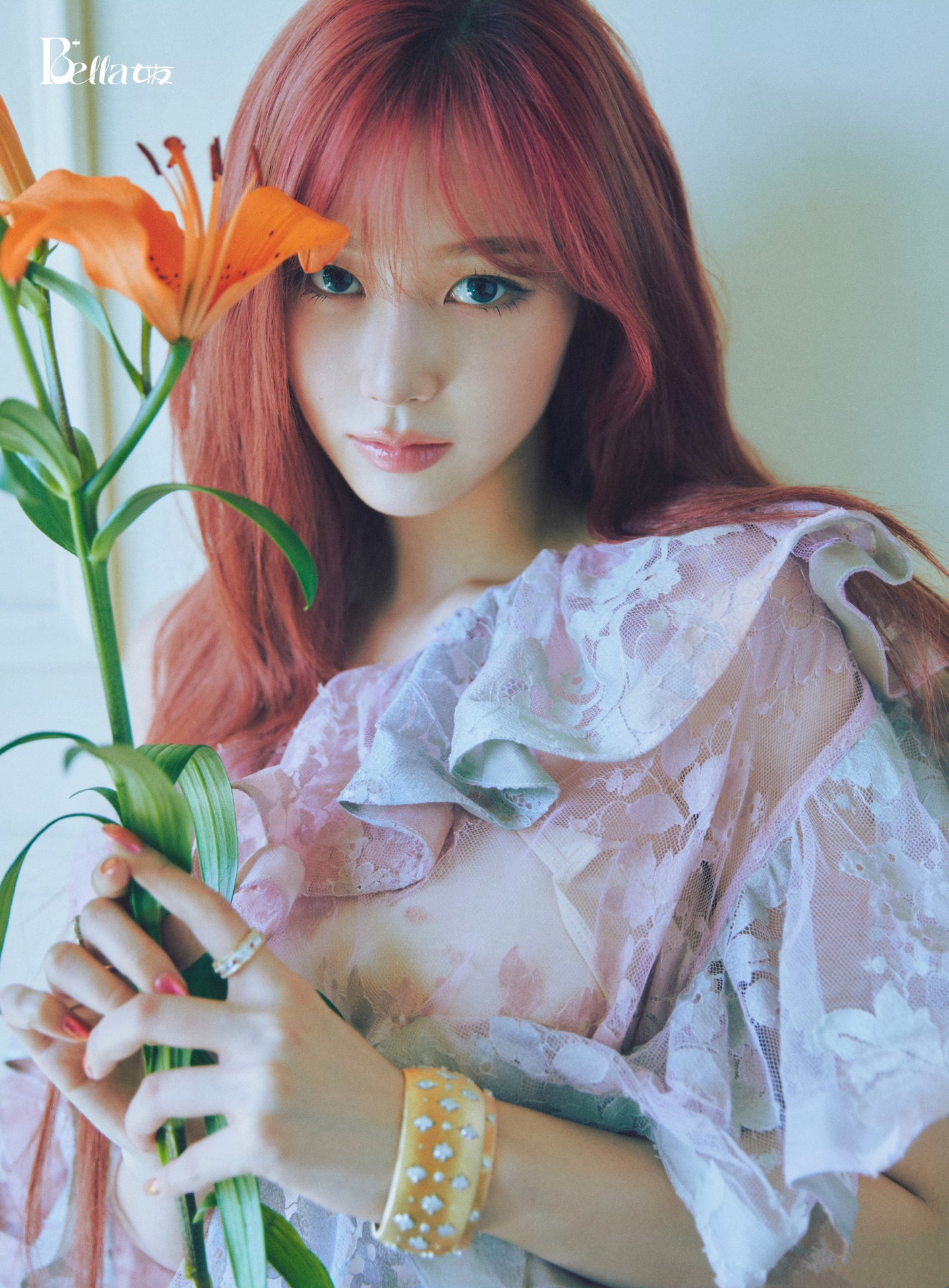 Zimmerman Weaving the pink-purple hues and warm orange of spring into the tex...