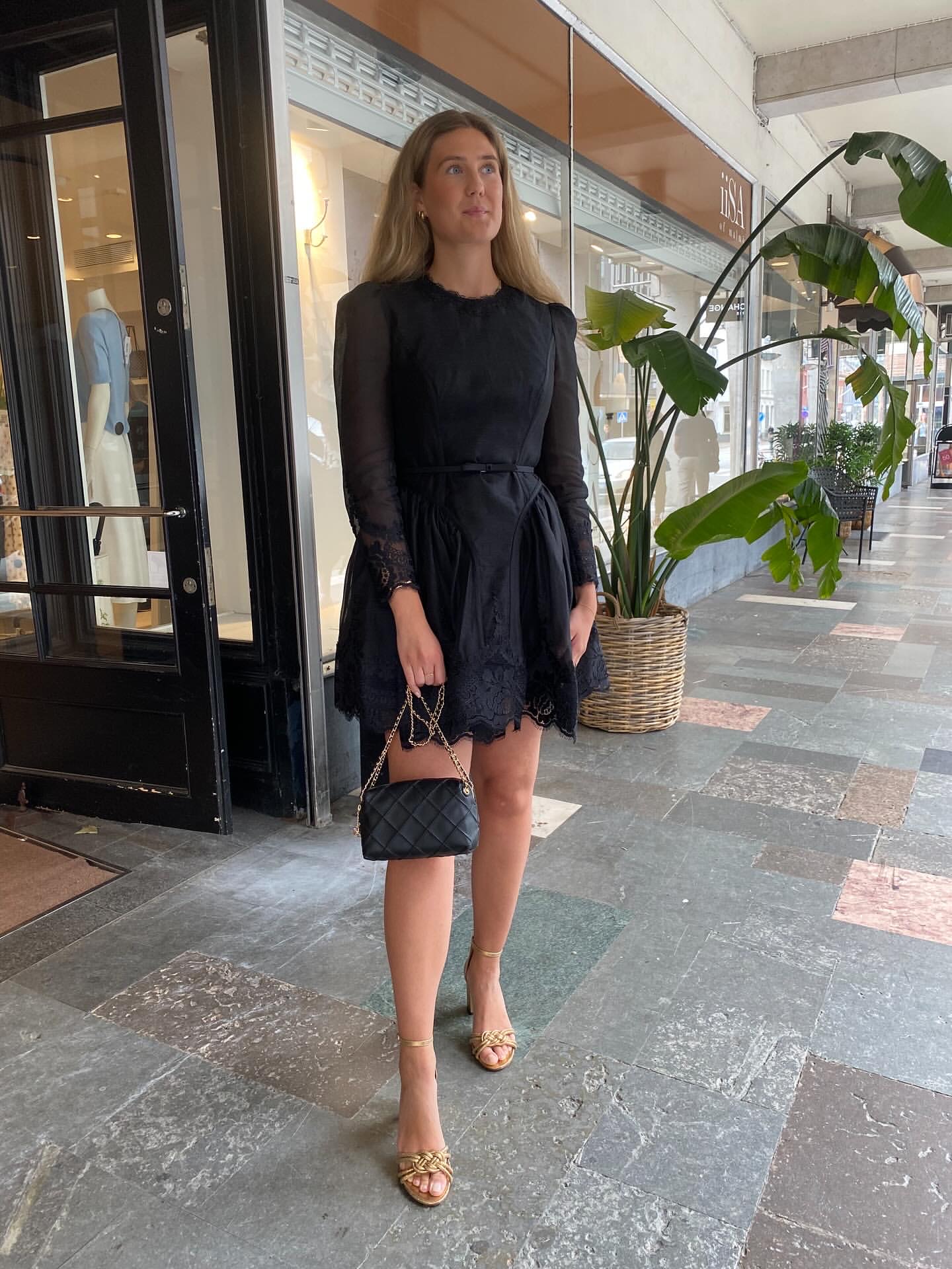 Zimmerman This black tulle lace mini dress is the perfect interpretation of F...