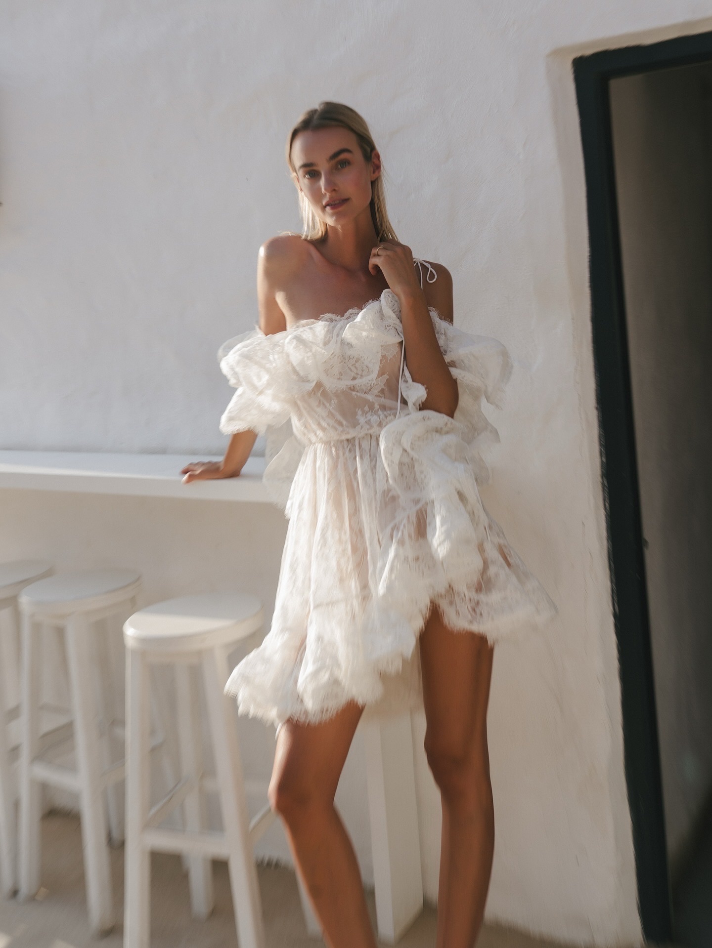 Zimmerman White lace, ruffled softness, and sunlight tangled in the fabric