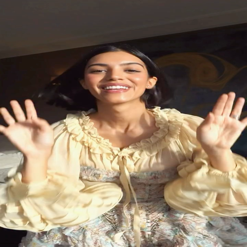 Zimmerman cream tulle blouse with lazy ruffles pairs with a textured tiered m...