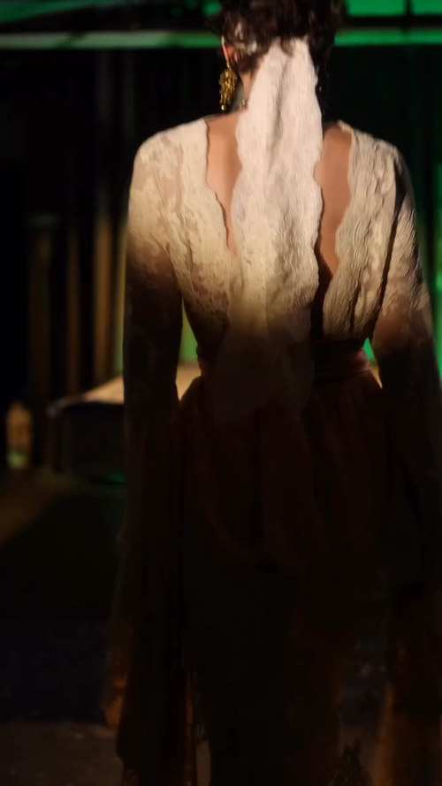 Zimmerman The translucent texture of ivory lace wraps the soft sheen of peach...