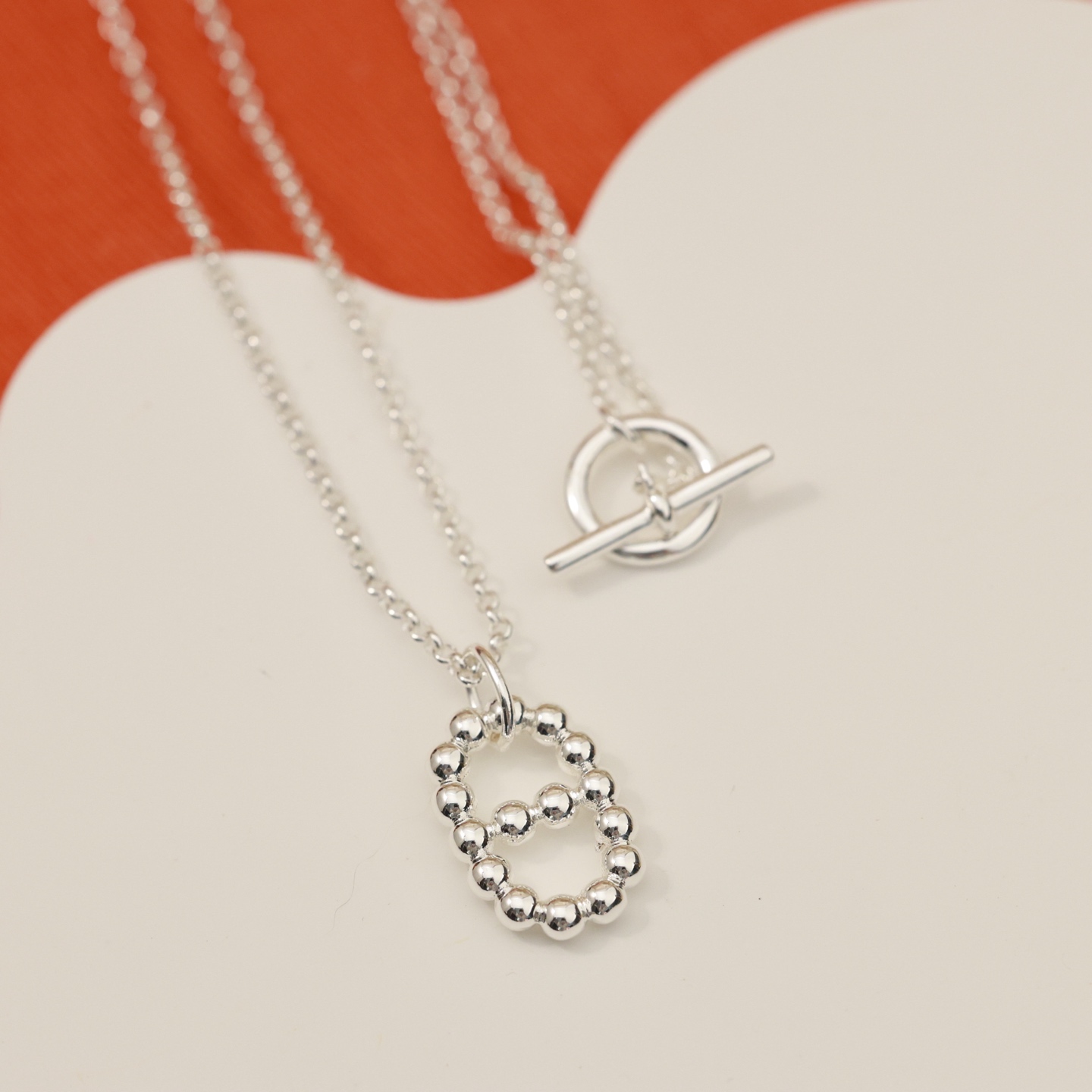 Collier Hermes Farandole métal argenté métal doré rose 40cm