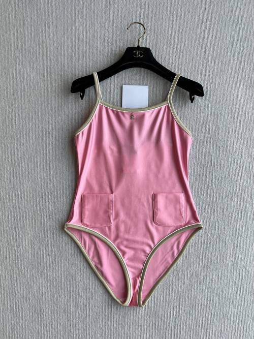 Elegant Pink Swimsuit with Pockets and Trim Detail - Stylish One-Piece Bathing Suit 1 Elegant Pink Swimsuit with Pockets and Trim Detail - Stylish One-Piece Bathing Suit