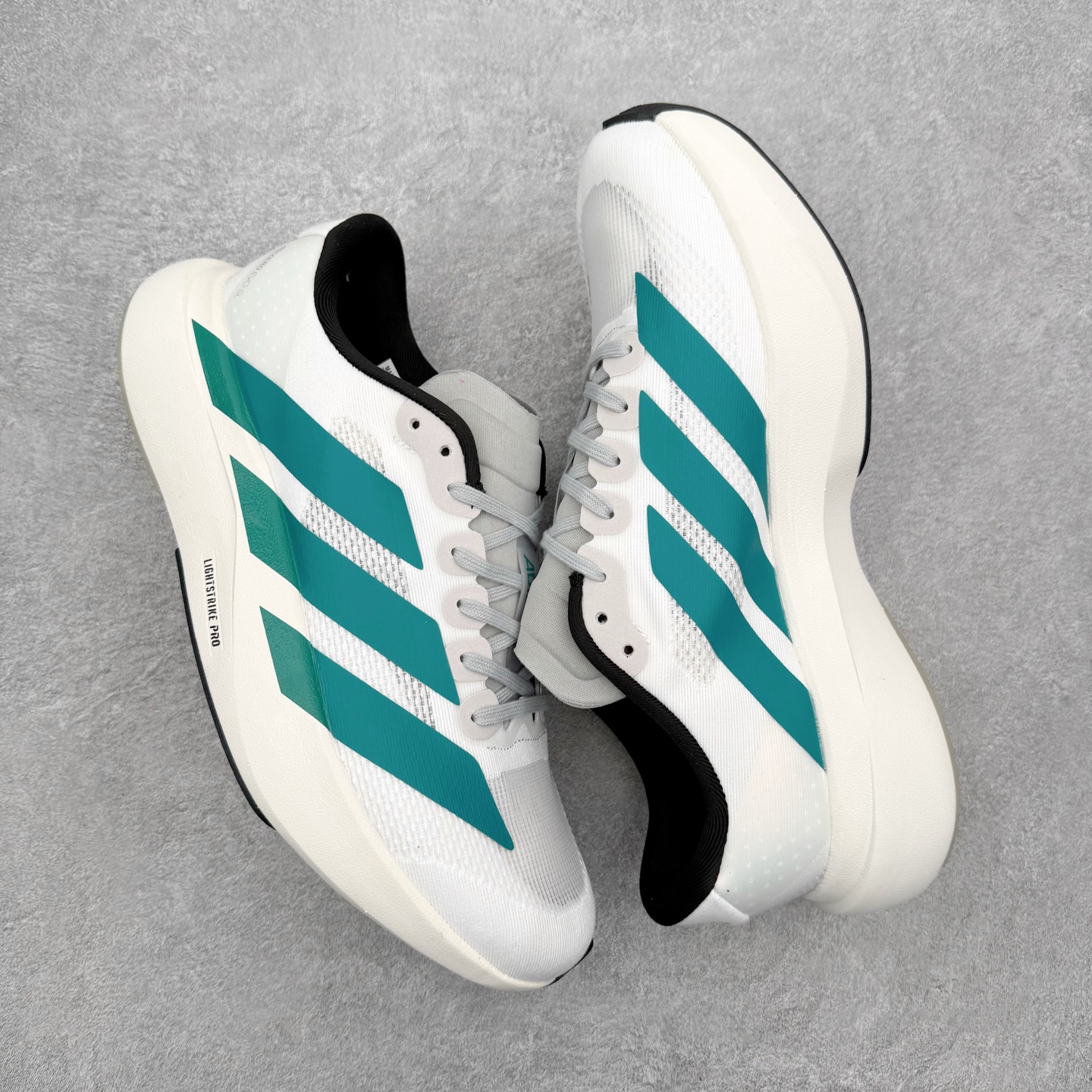 AD Adizero EVO SL M 马拉松竞速专业跑鞋 CELERMESH针织网面非常轻薄 纤维间的