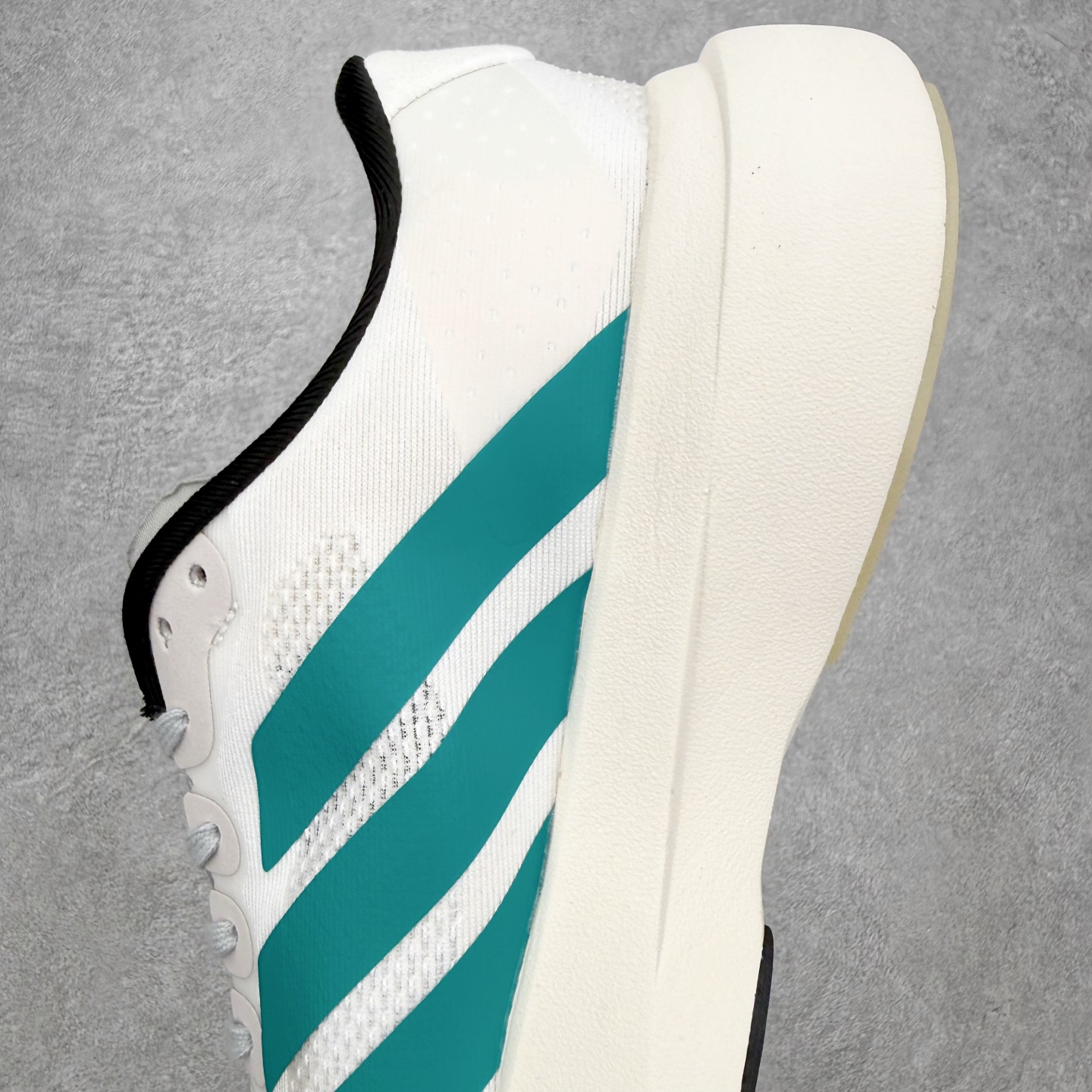 AD Adizero EVO SL M 马拉松竞速专业跑鞋 CELERMESH针织网面非常轻薄 纤维间的