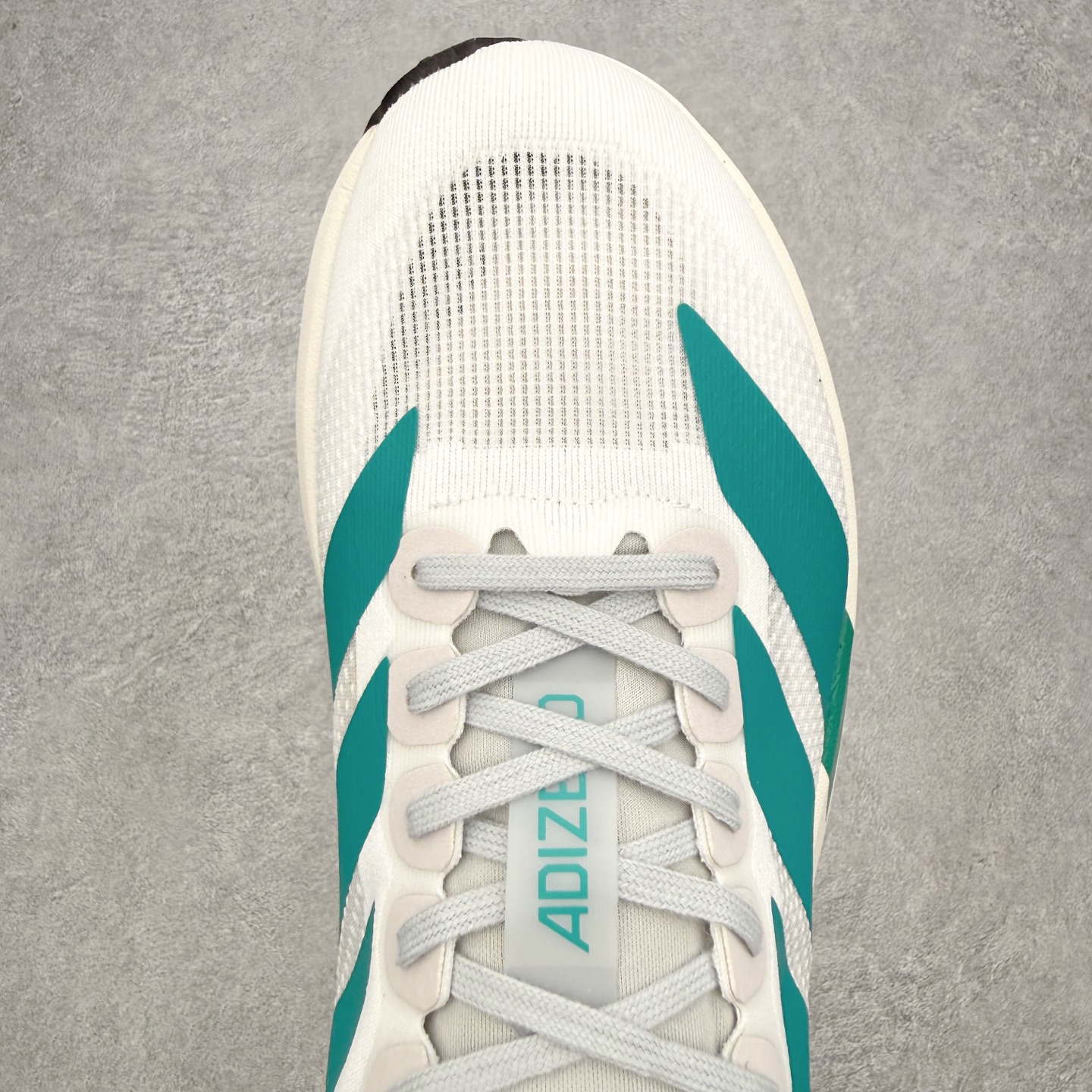 AD Adizero EVO SL M 马拉松竞速专业跑鞋 CELERMESH针织网面非常轻薄 纤维间的