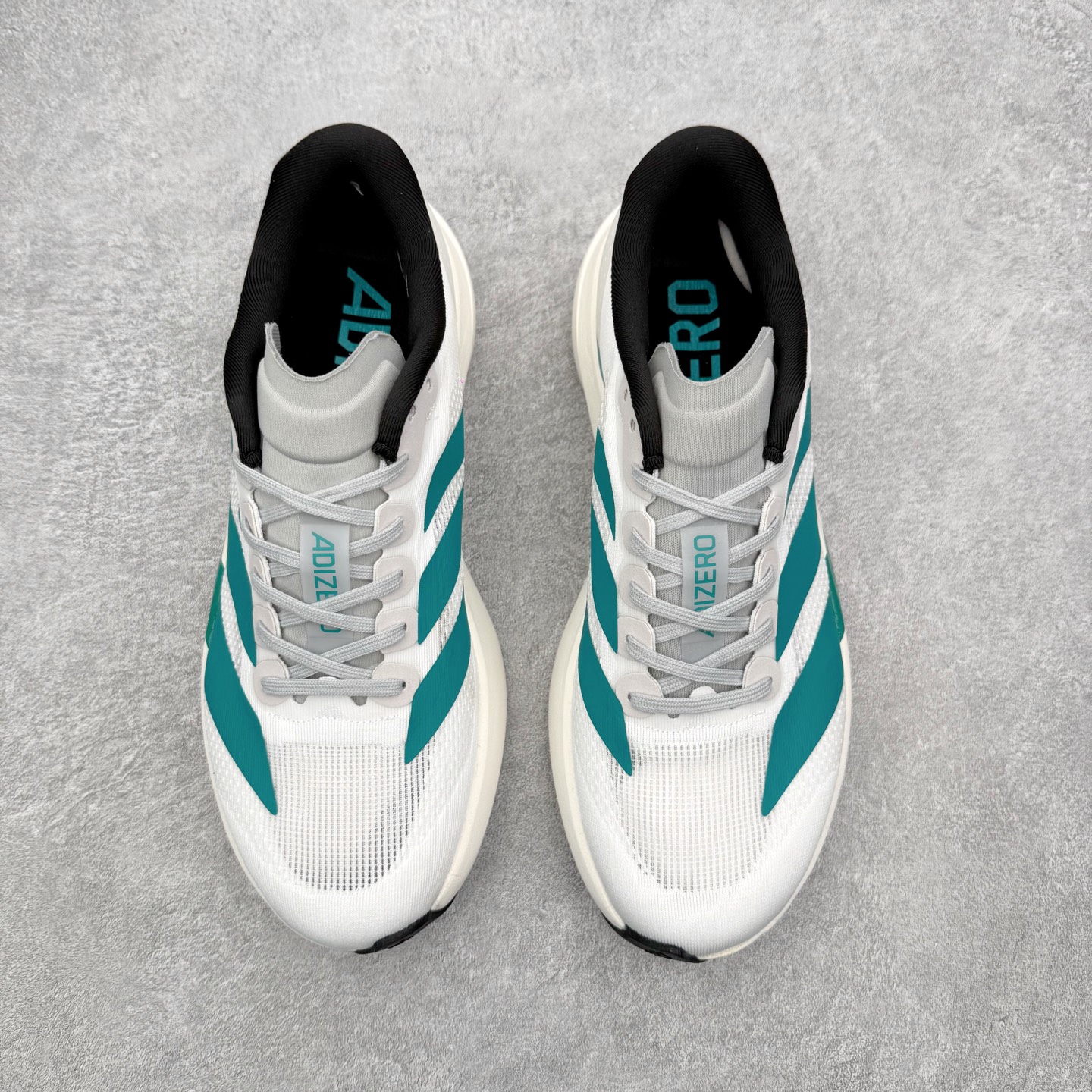 AD Adizero EVO SL M 马拉松竞速专业跑鞋 CELERMESH针织网面非常轻薄 纤维间的