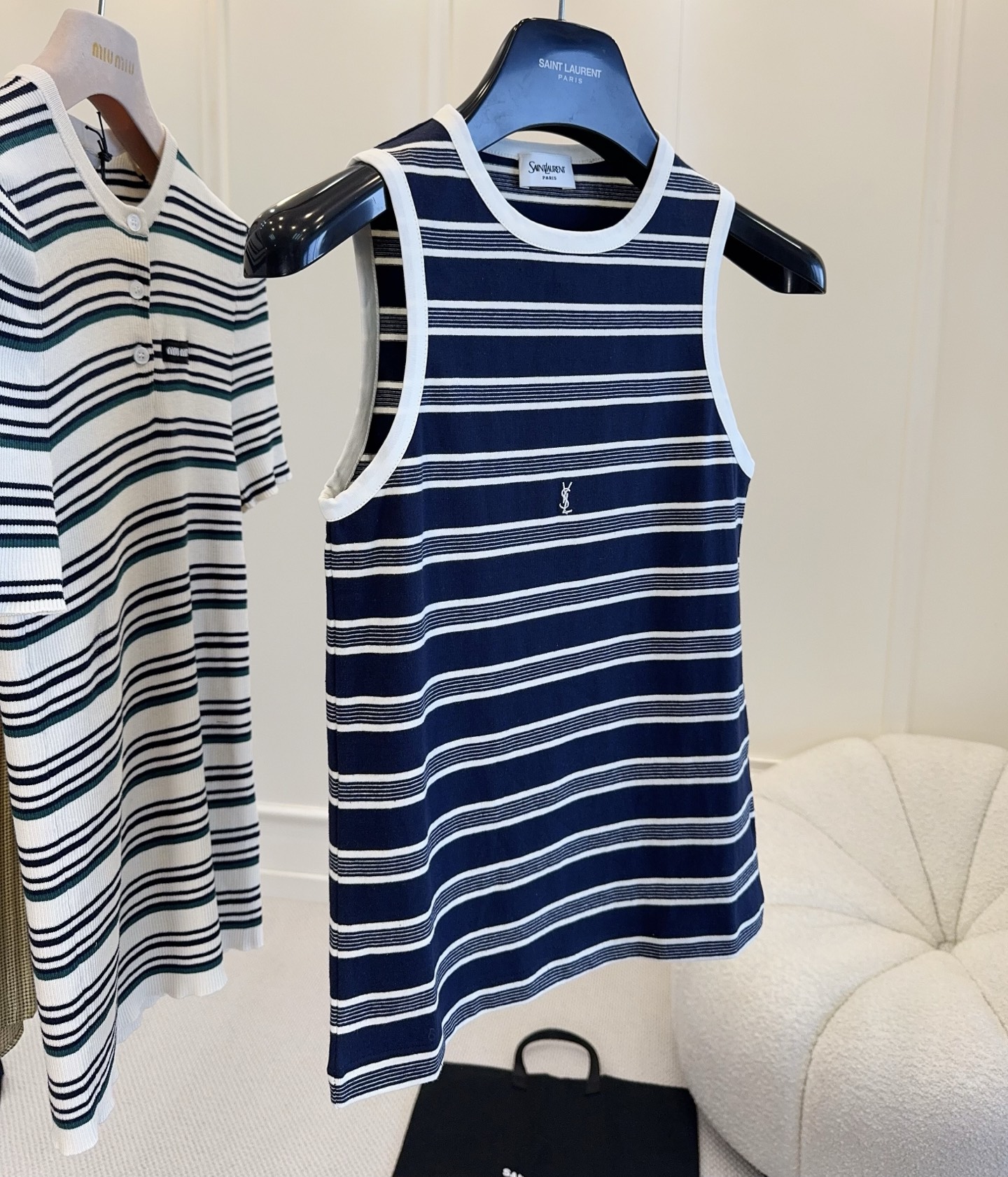 NO:801214,YSL2026 new blue and white striped knitted vest, made of cotton fabric, breathable and skin-friendly, super comfortable to wear in summer!  Sleeveless round neck design, blue and white stripes + chest logo, simple and recognizable. The loose fit is slim and versatile, and it goes well with jeans, wide-leg pants or skirts. It can easily switch between casual or light luxury style ~ The striped elements are classic and timeless, and can be easily used for daily commuting and vacation., saint laurent, skirts, jeans,19860909YSL2026新款蓝白条纹针织背心,棉质面料,透气亲肤,夏天穿超舒服！无袖圆领设计,蓝白条纹+胸前Logo,简约又有辨识度.宽松版型显瘦百搭,配牛仔裤、阔腿裤或裙装都很出彩,轻松切换休闲or轻奢风～条纹元素经典不过时,日常通勤、度假都能轻松驾驭,,saint laurent,skirts,jeans,,Women's clothing